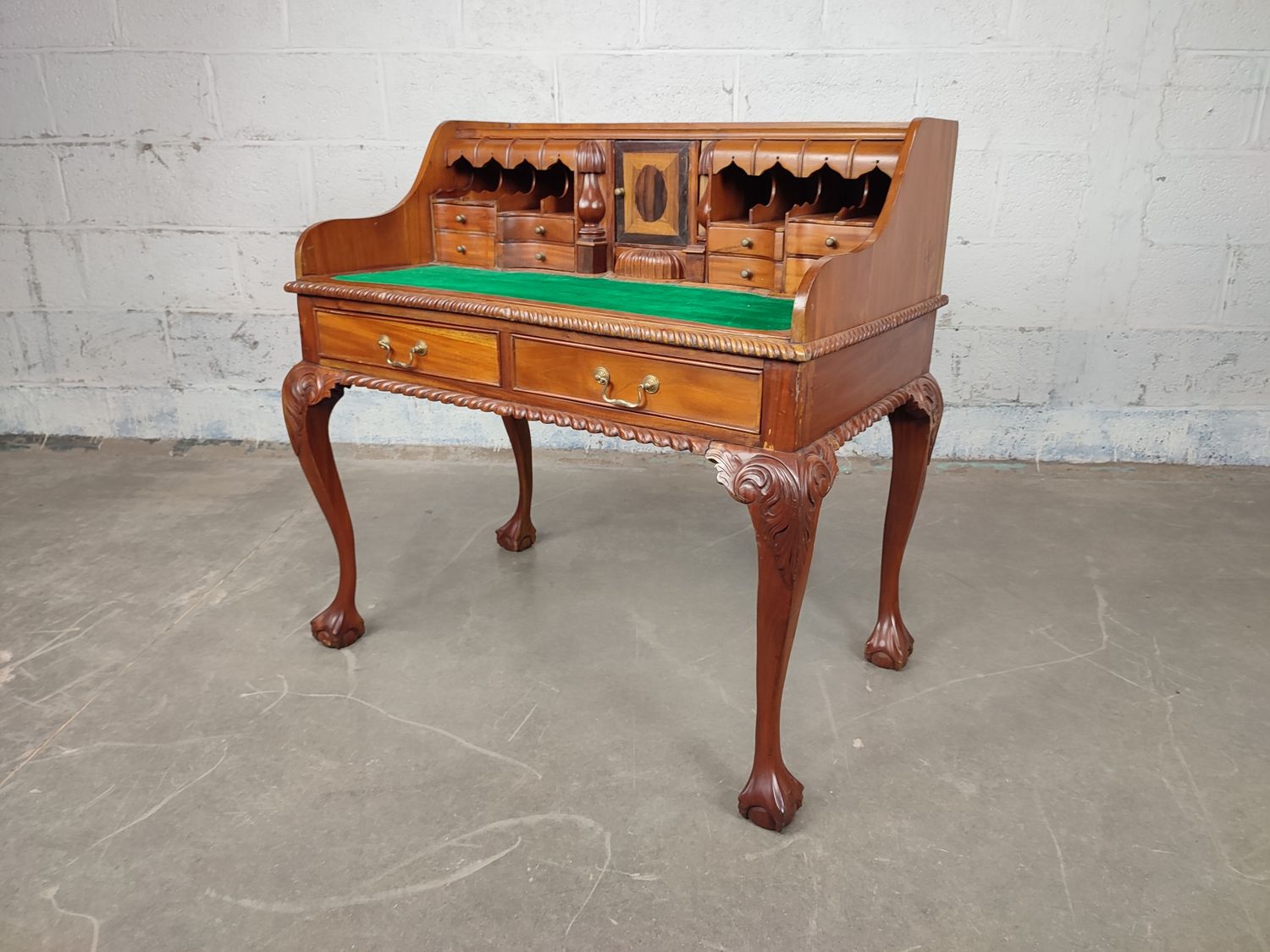 Antique wooden desk with hidden drawers