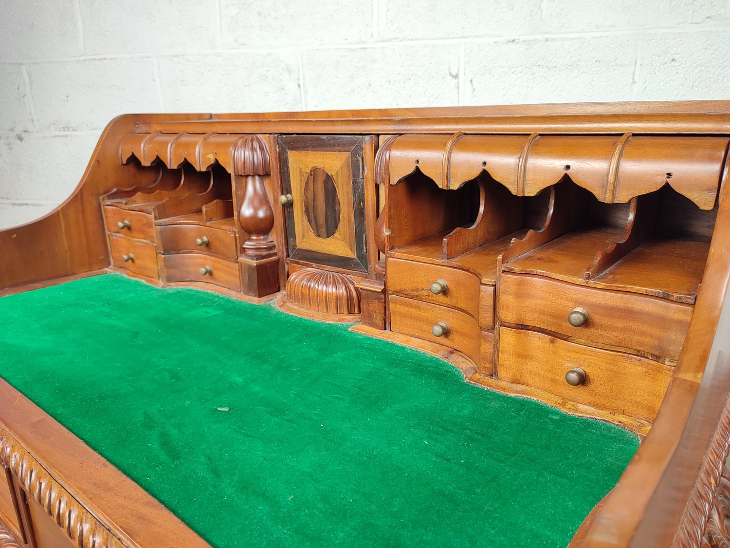 Antique wooden desk with hidden drawers
