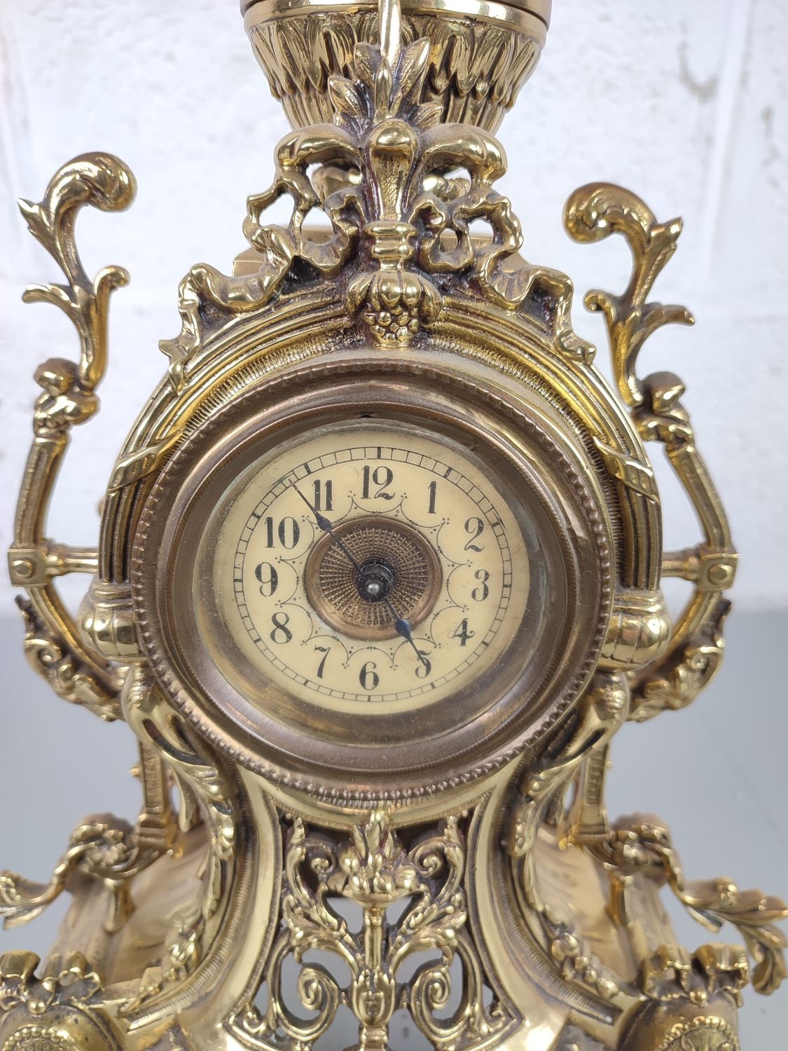 Antique mantel clock in brass