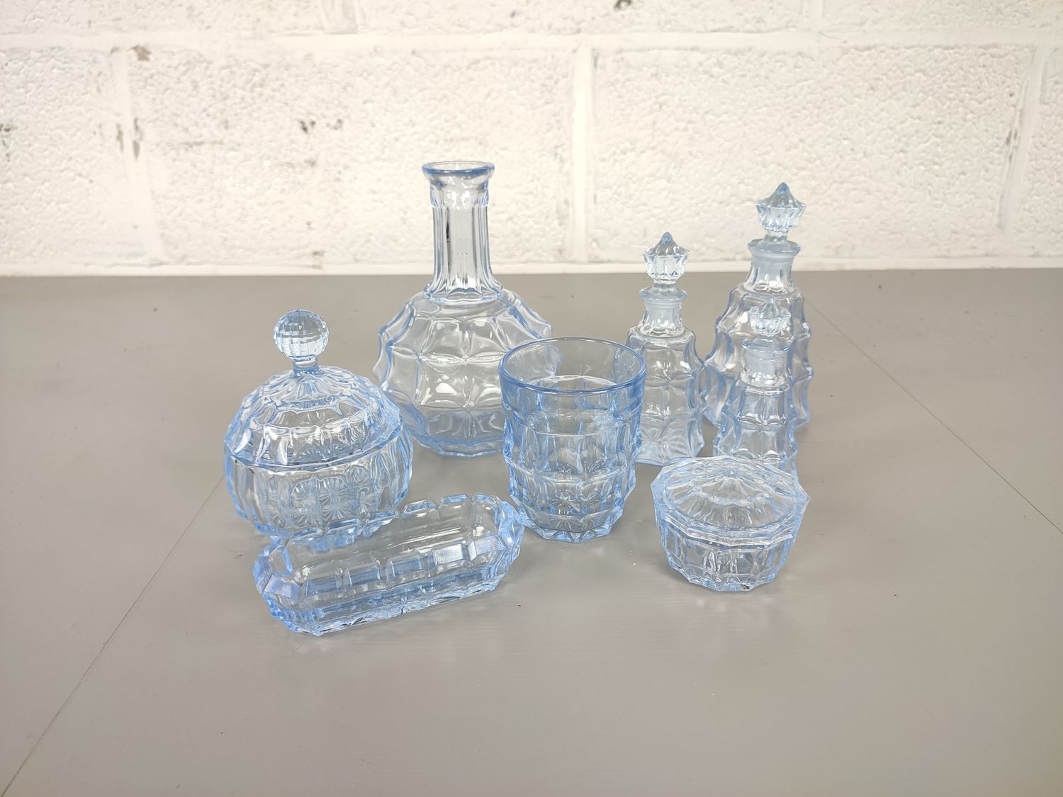 Blue pressed glass dressing table set