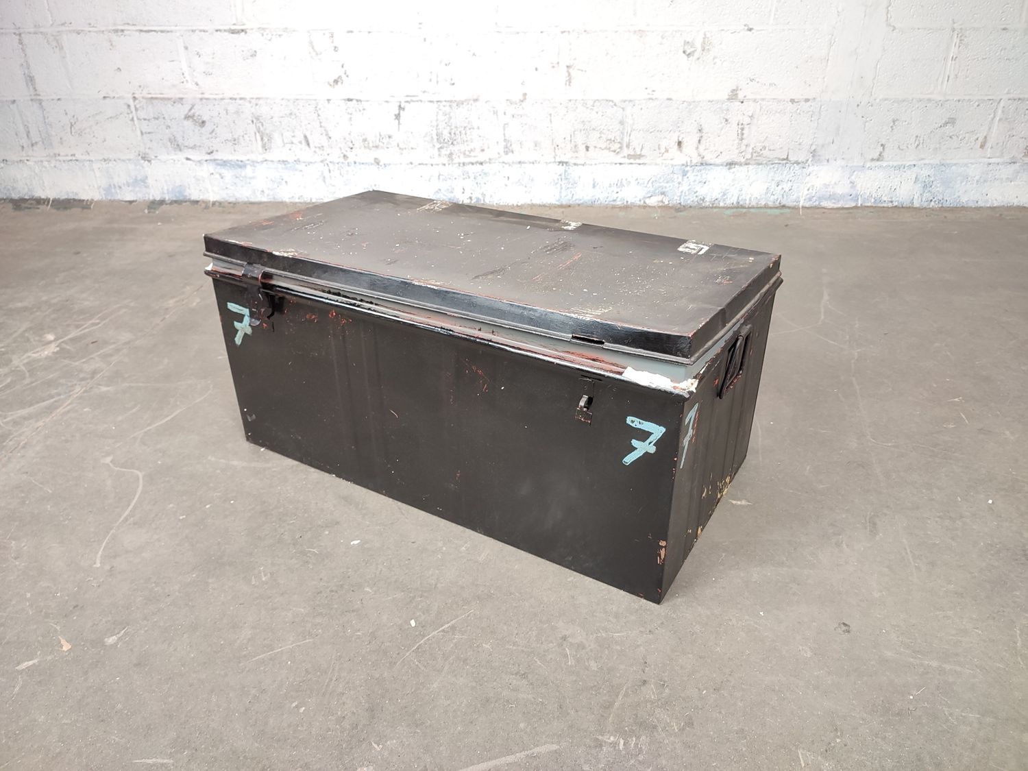 Large black metal chest