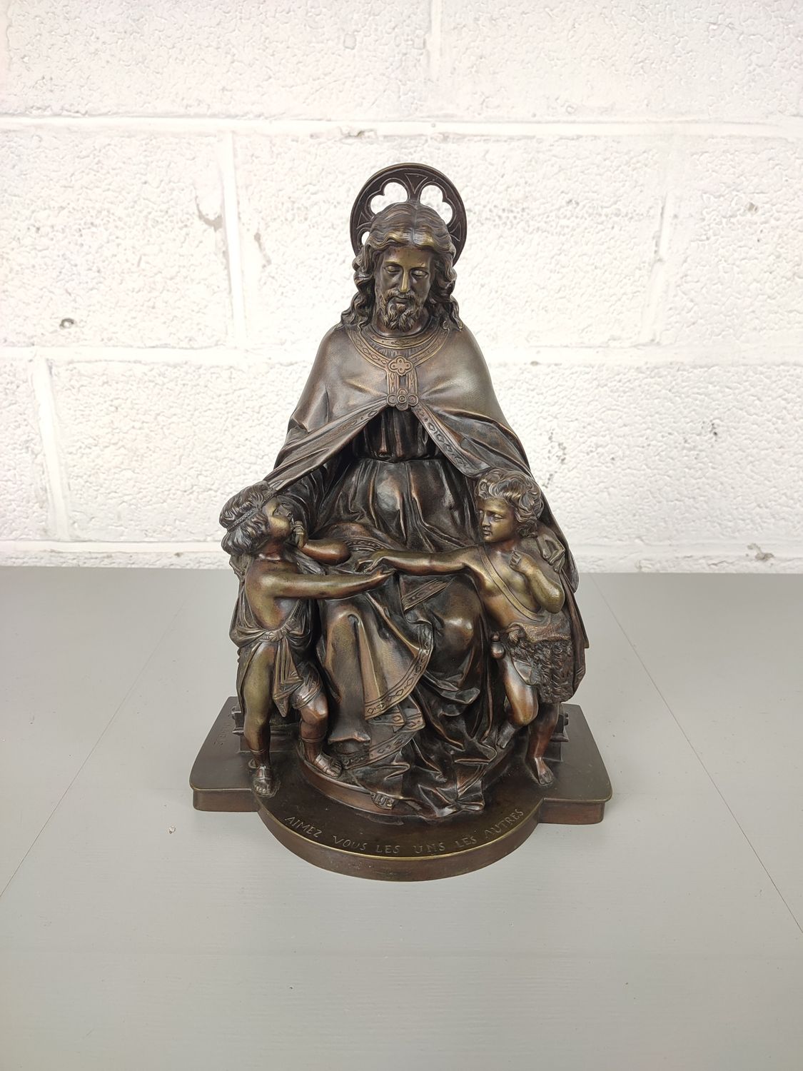 Bronze statue of Jesus with children