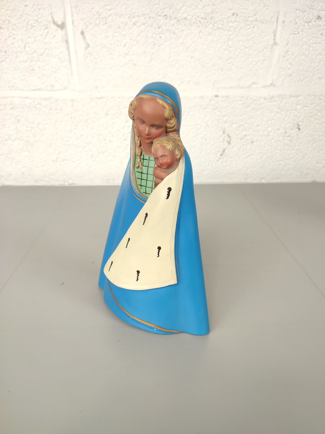 Plaster statue of Mary with child