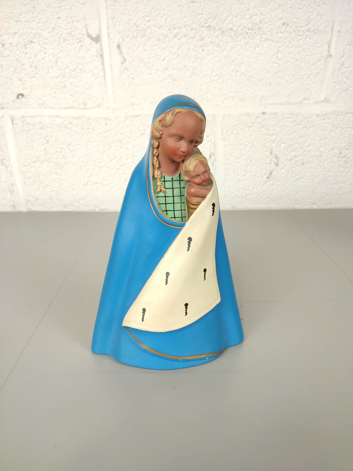 Plaster statue of Mary with child