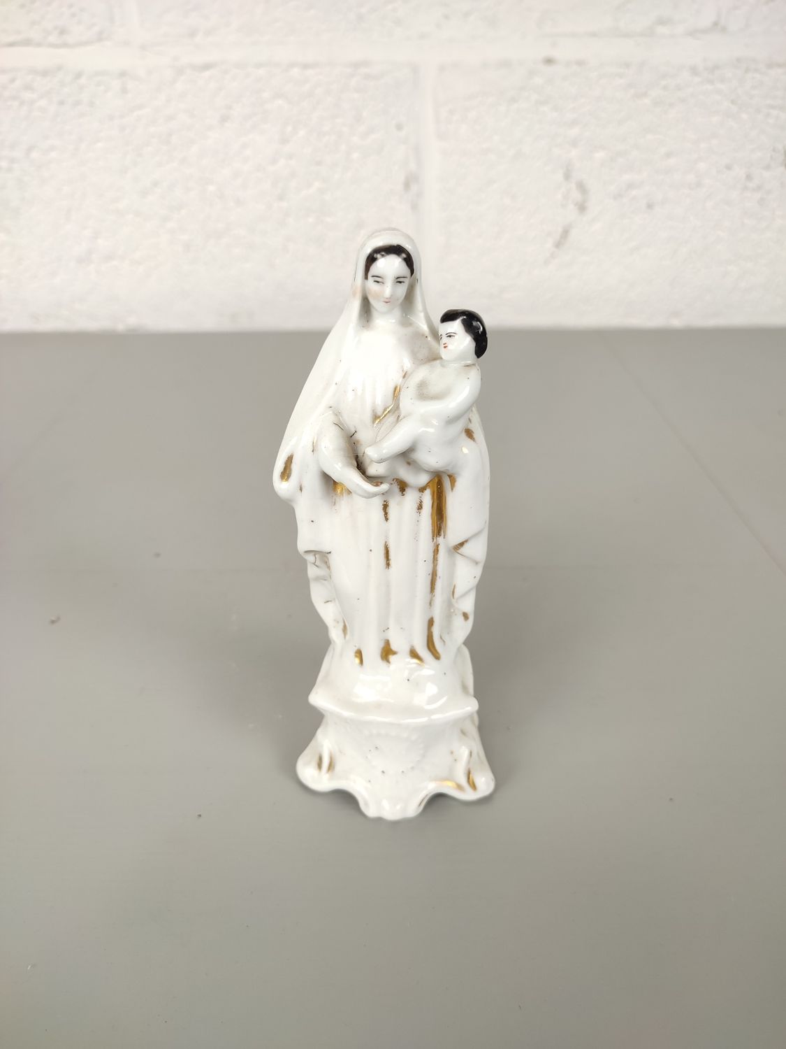Porcelain statue of Mary with child