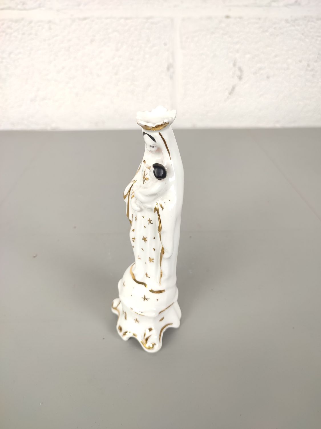 Porcelain statue of Mary with child