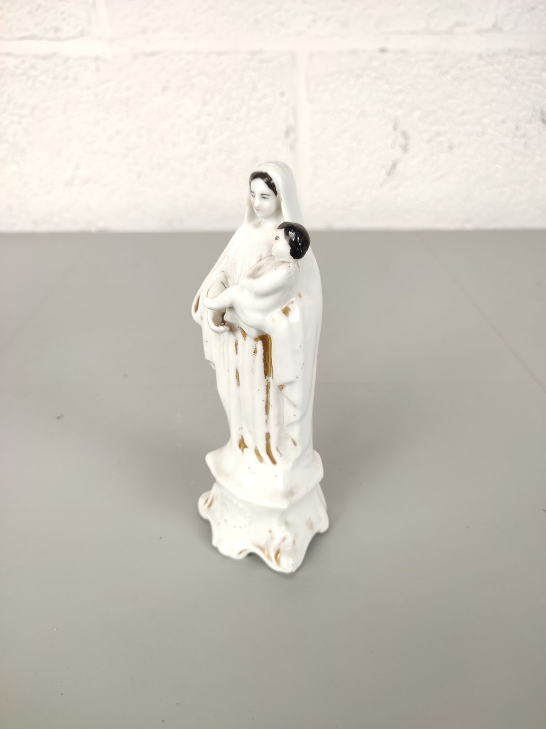 Porcelain statue of Mary with child