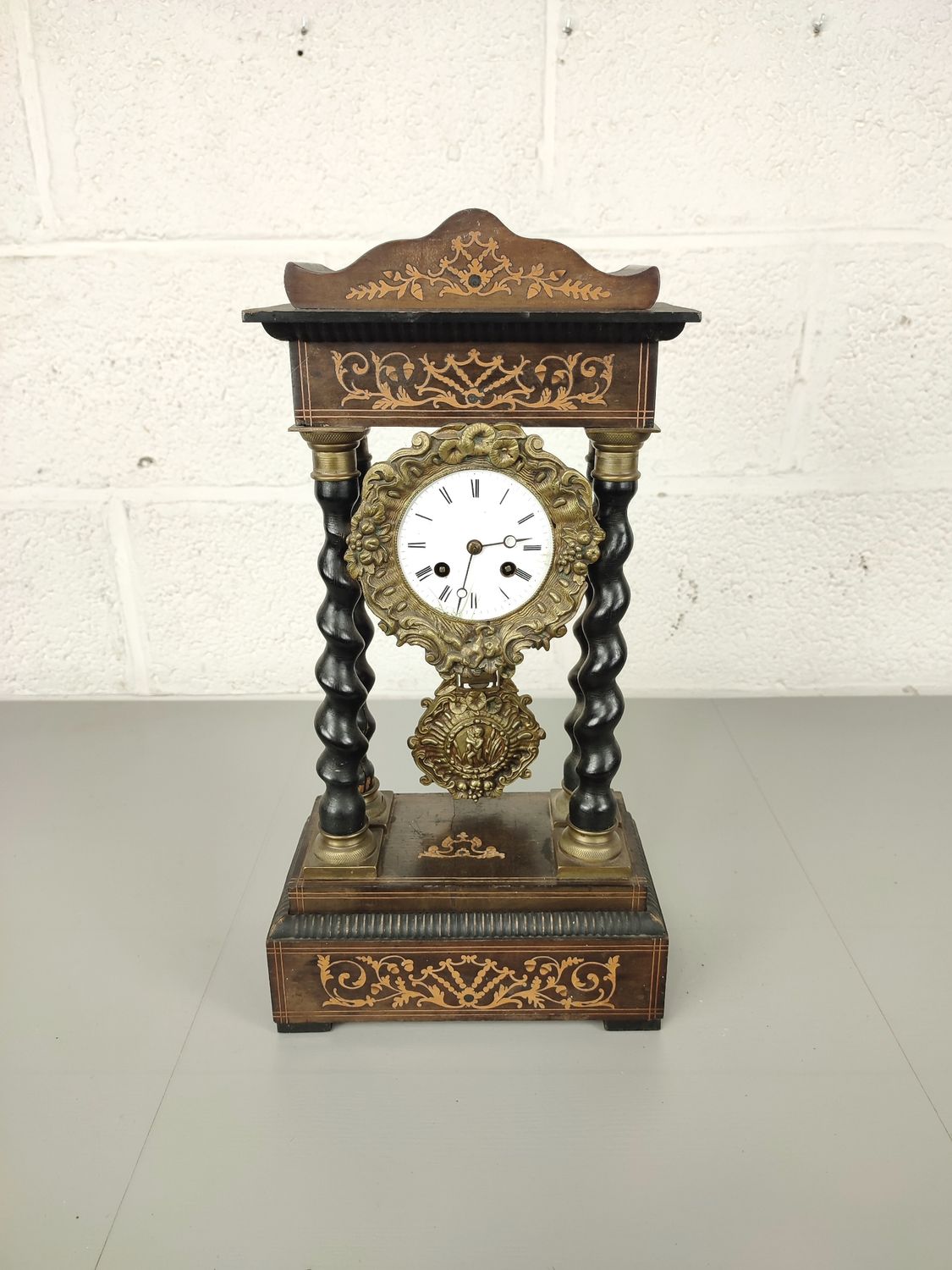 Antique wooden column clock