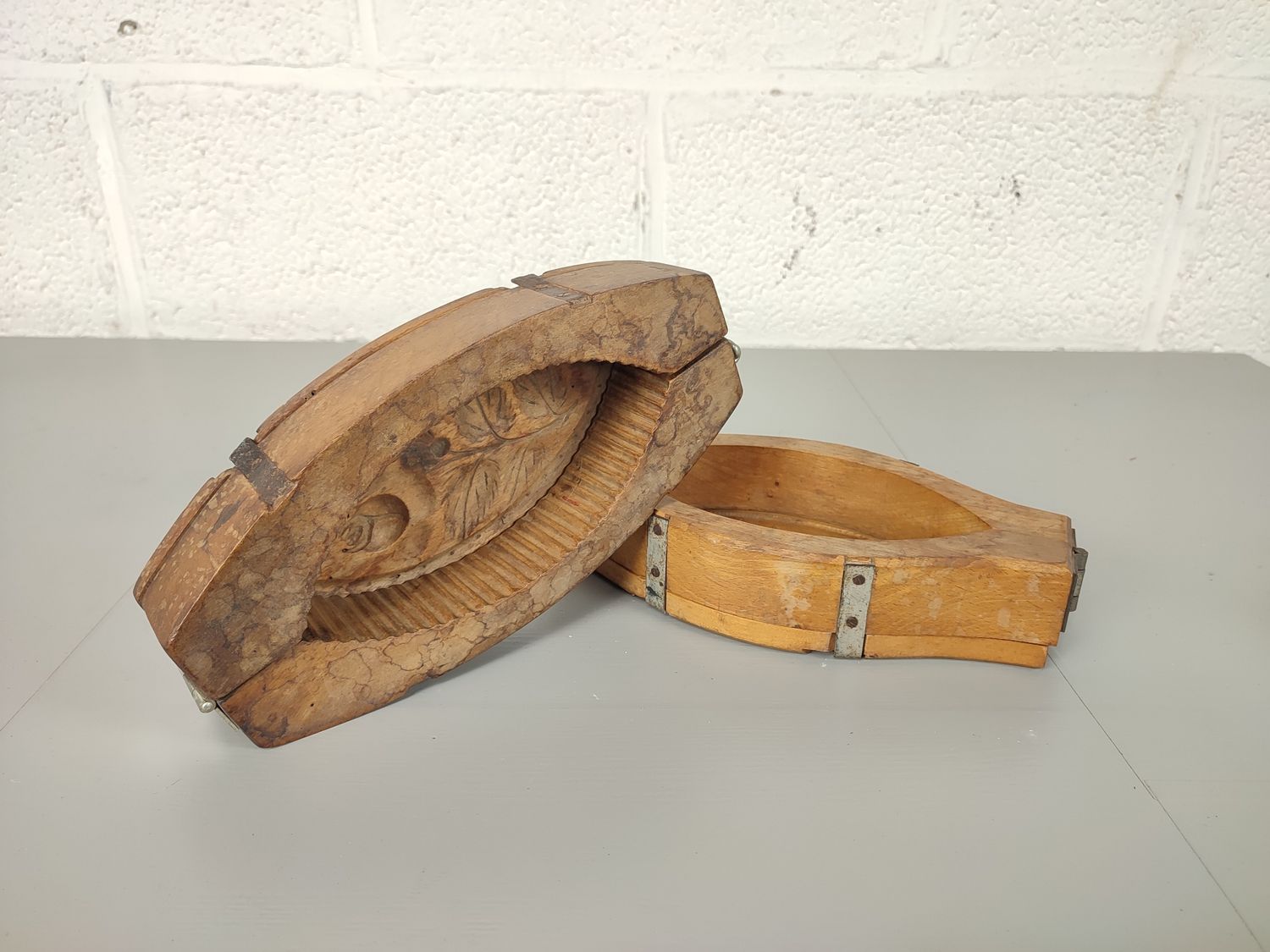 2 wooden butter molds