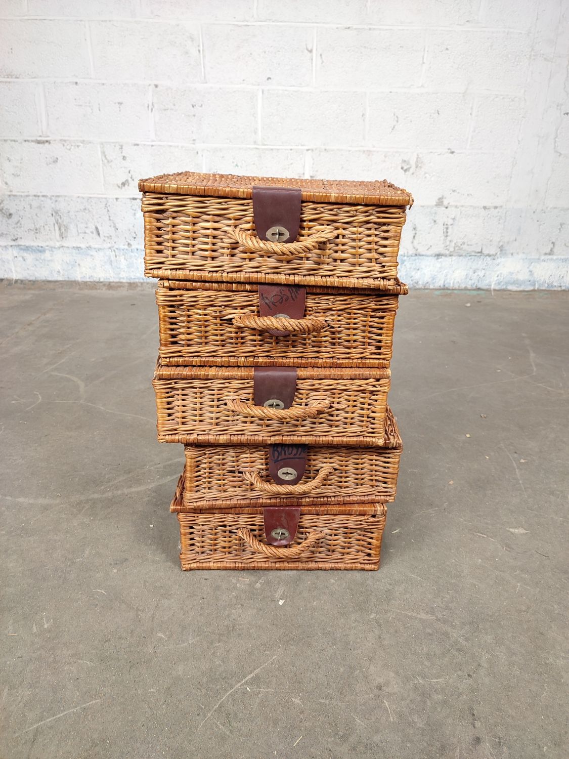 5 wicker suitcases