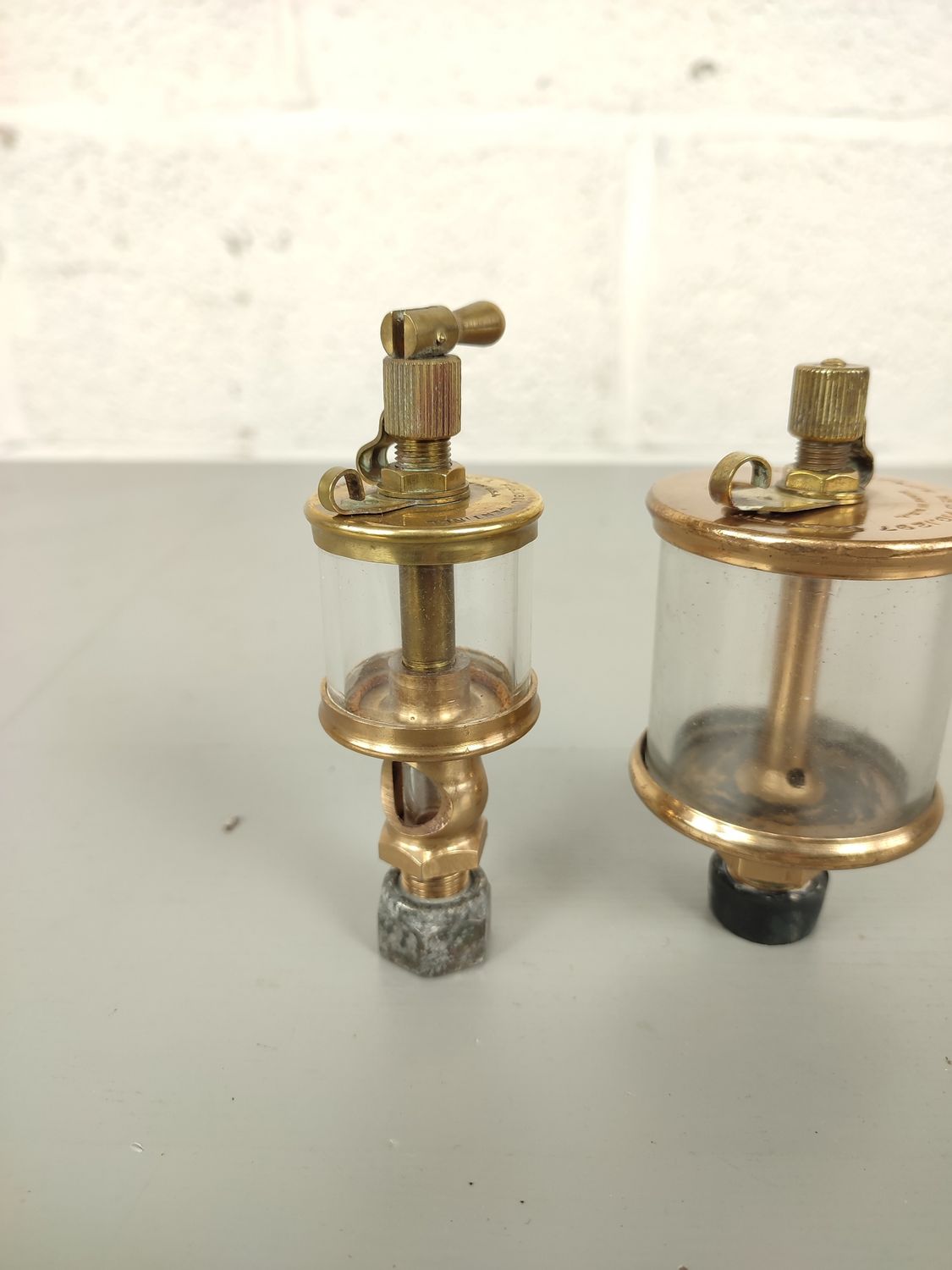 2 antique brass Lunkenheimer oilers
