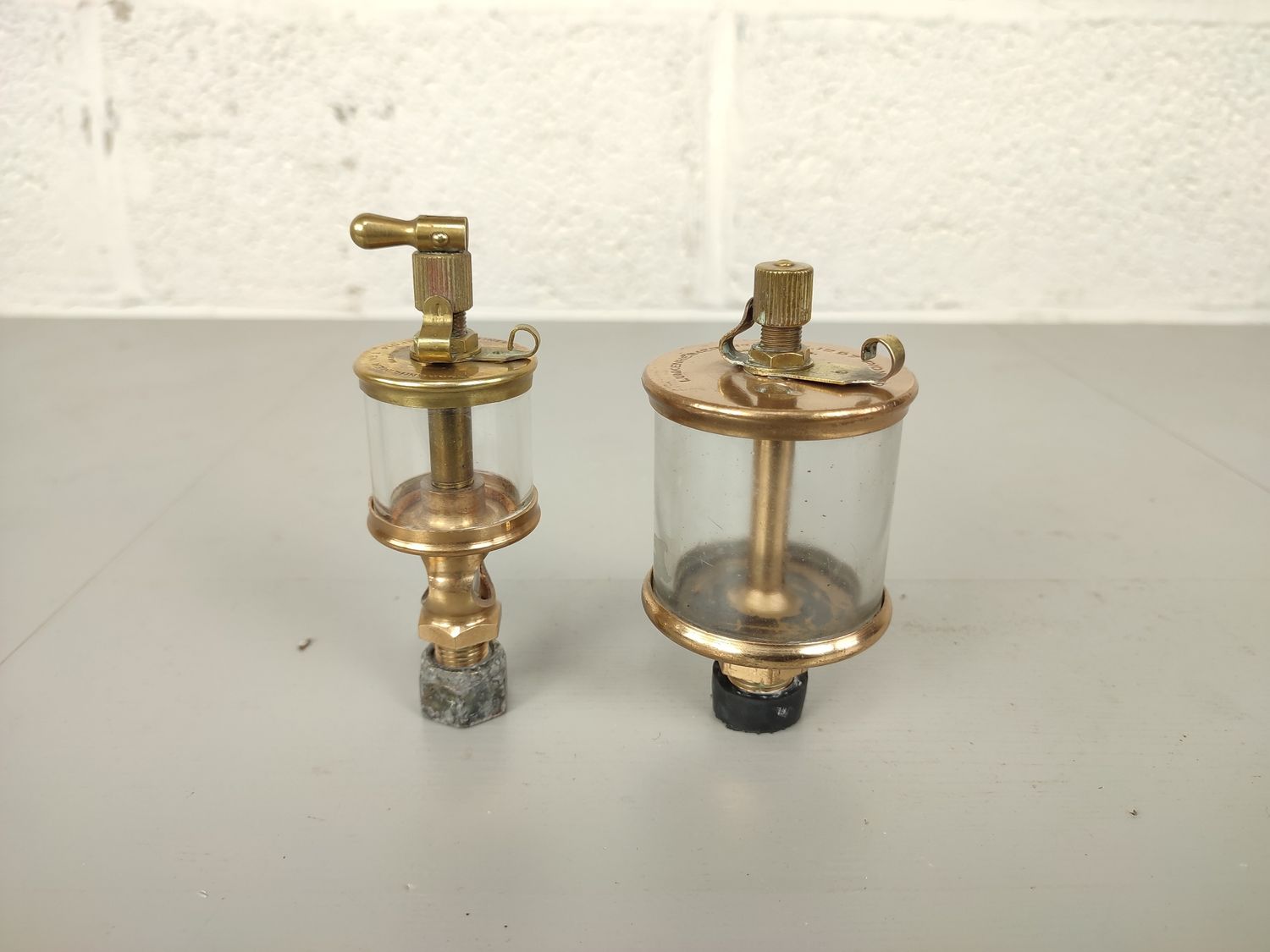 2 antique brass Lunkenheimer oilers