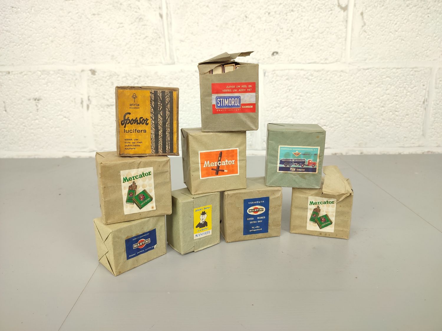 9 packs of matchboxes with advertisement