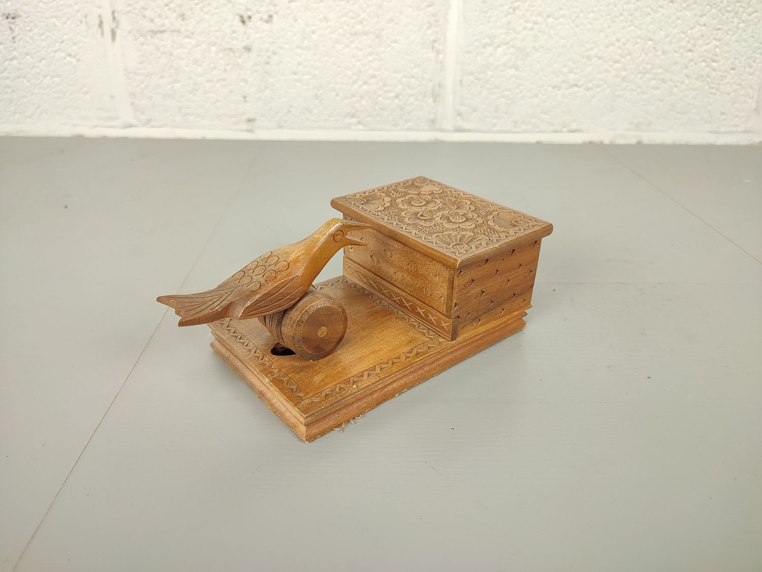 Wooden cigarette box with bird