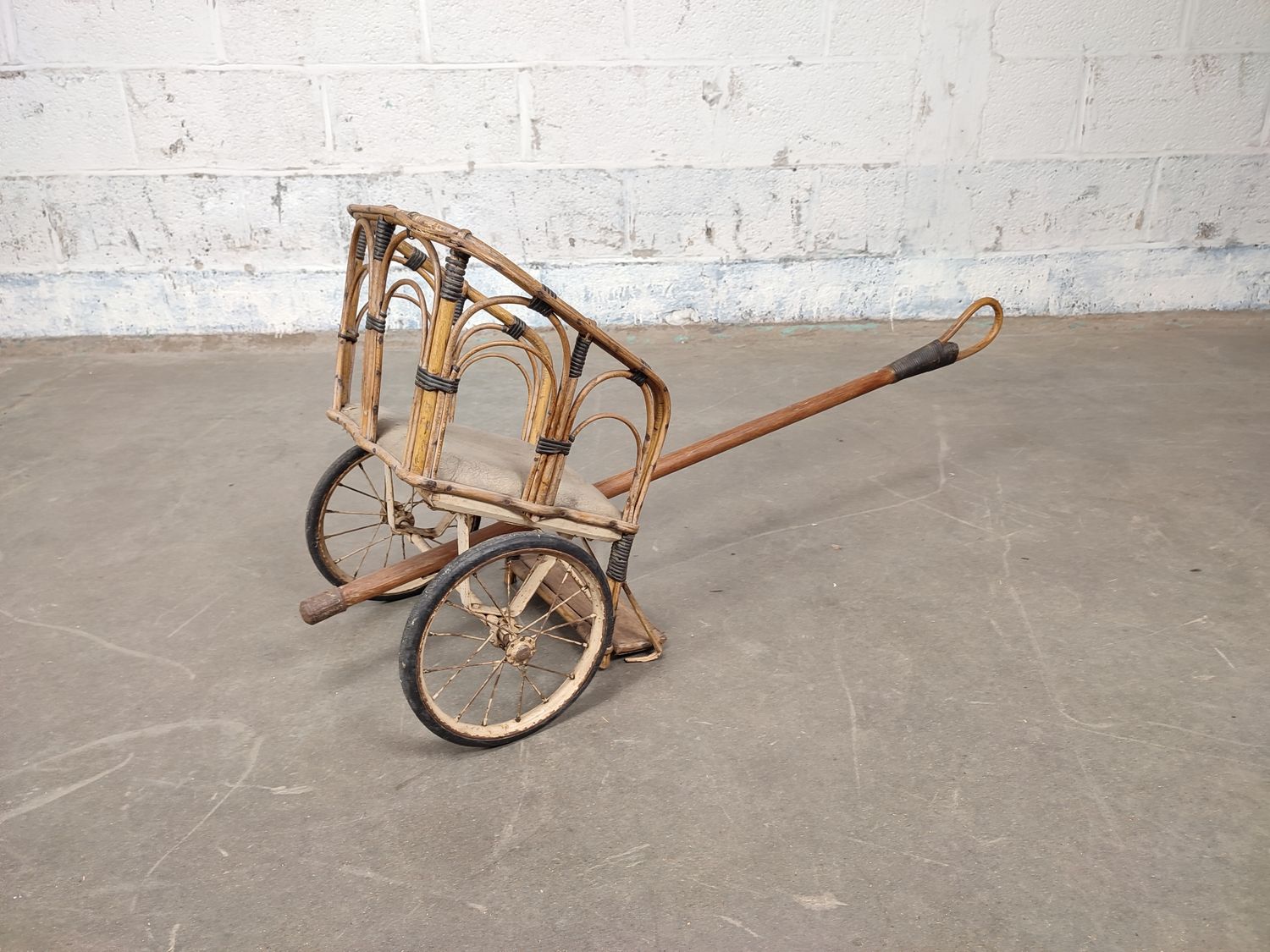 Antique rattan child's carriage
