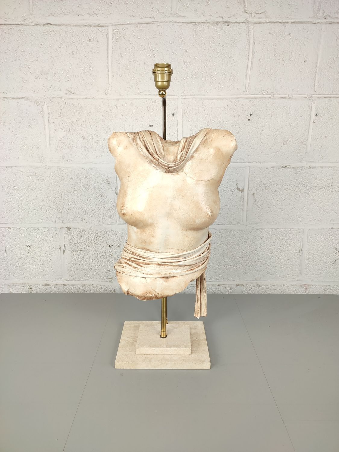 Table lamp with statue of a torso