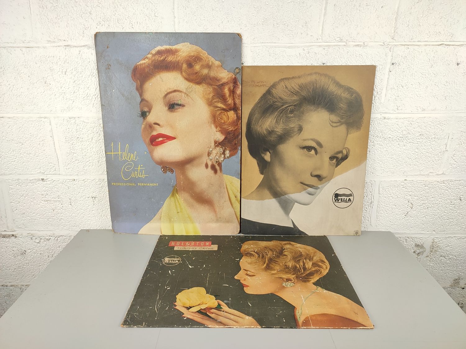 3 old cardboard hairsalon bllboards
