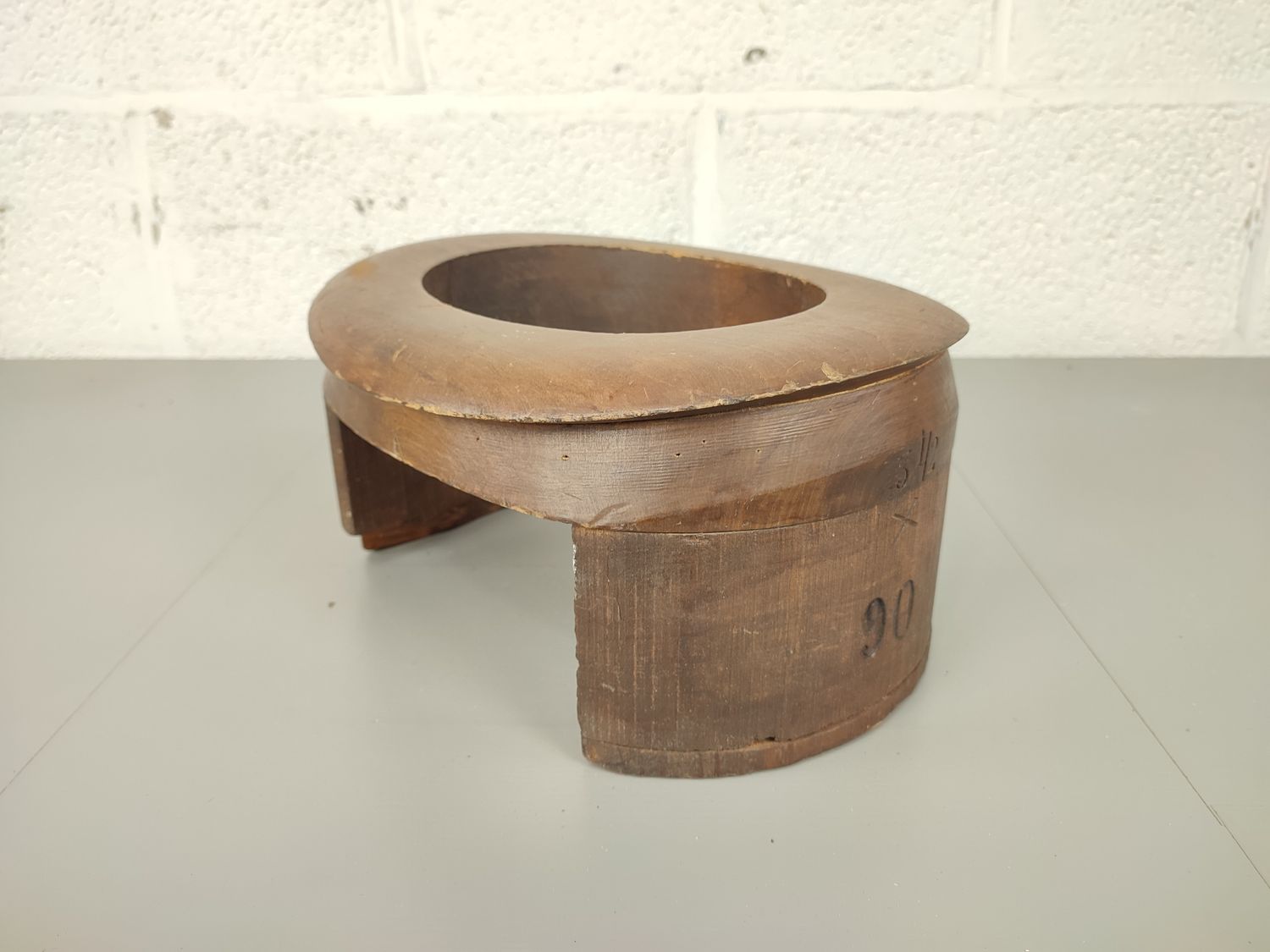 Old wooden hat mold