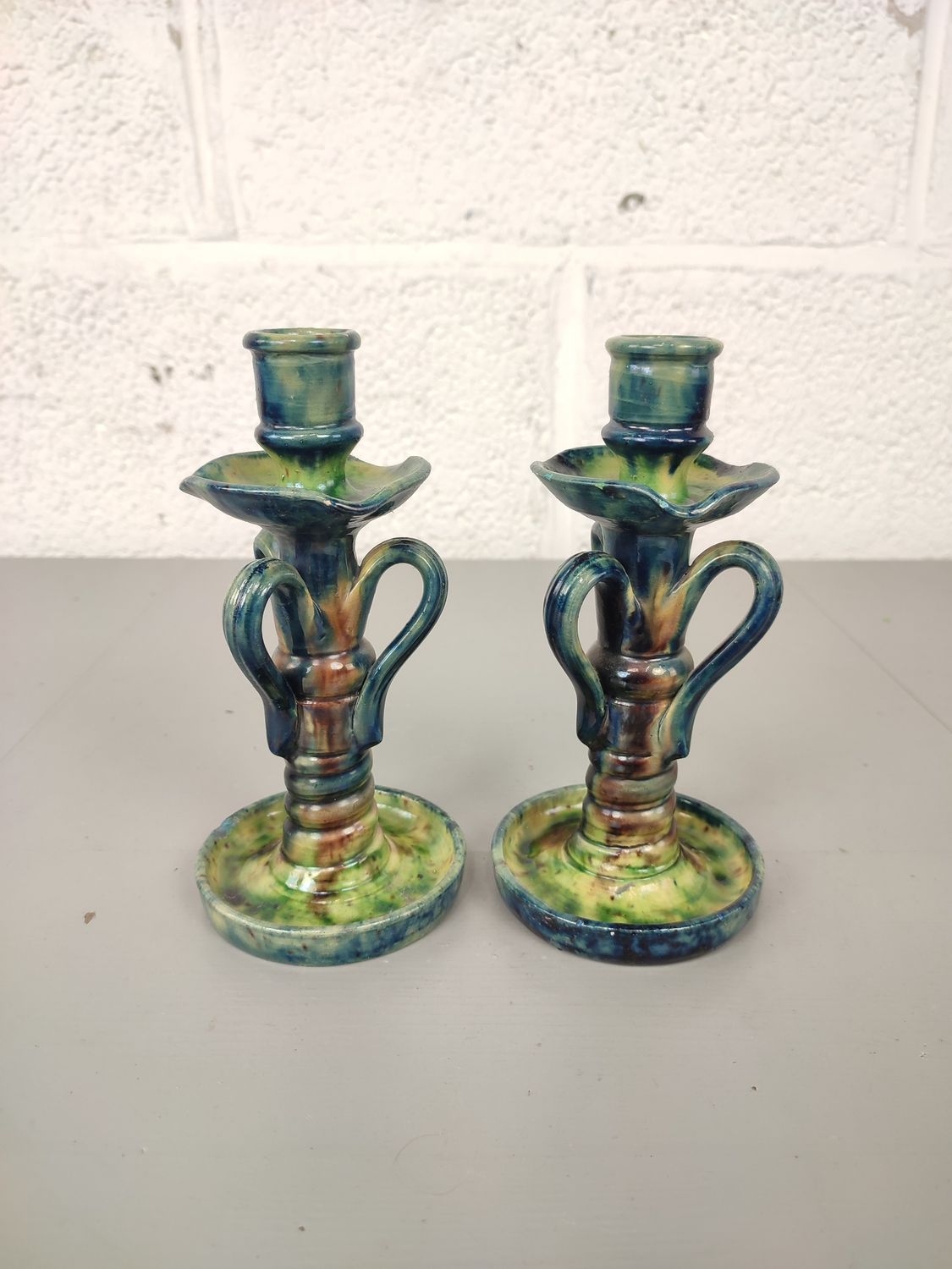 Pair of candlestick in Flemish earthenware