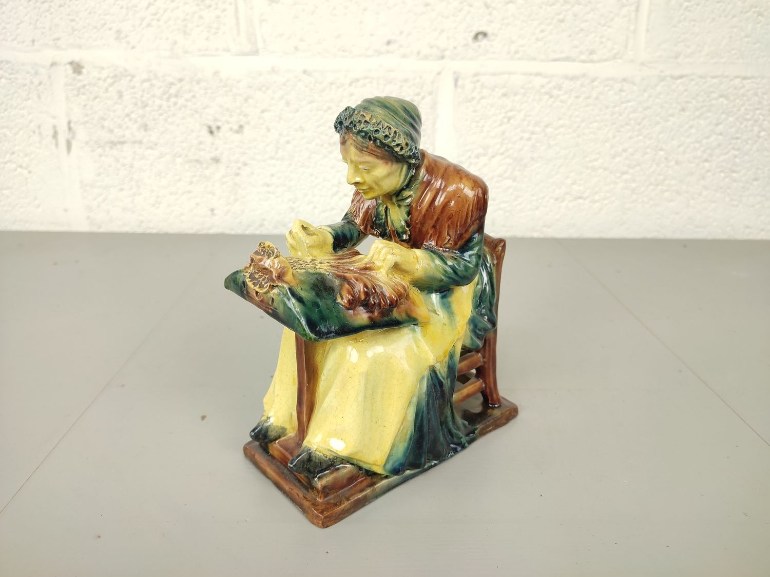 Lacemaker in Flemish pottery