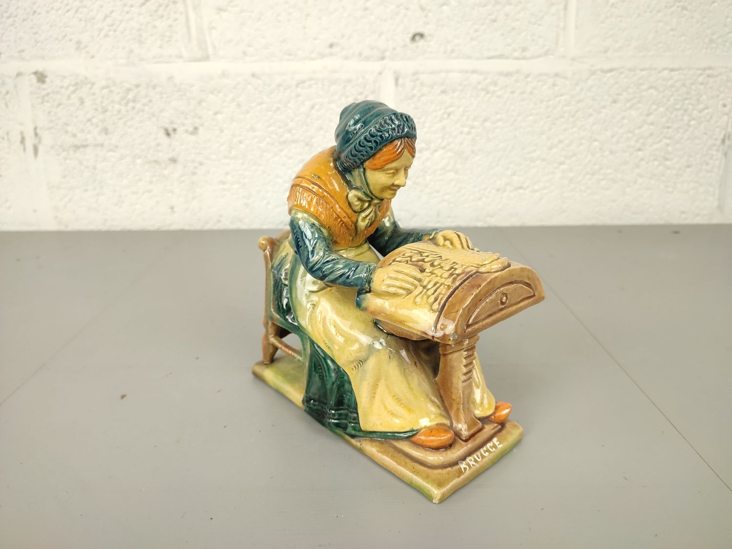 Lacemaker in Flemish pottery