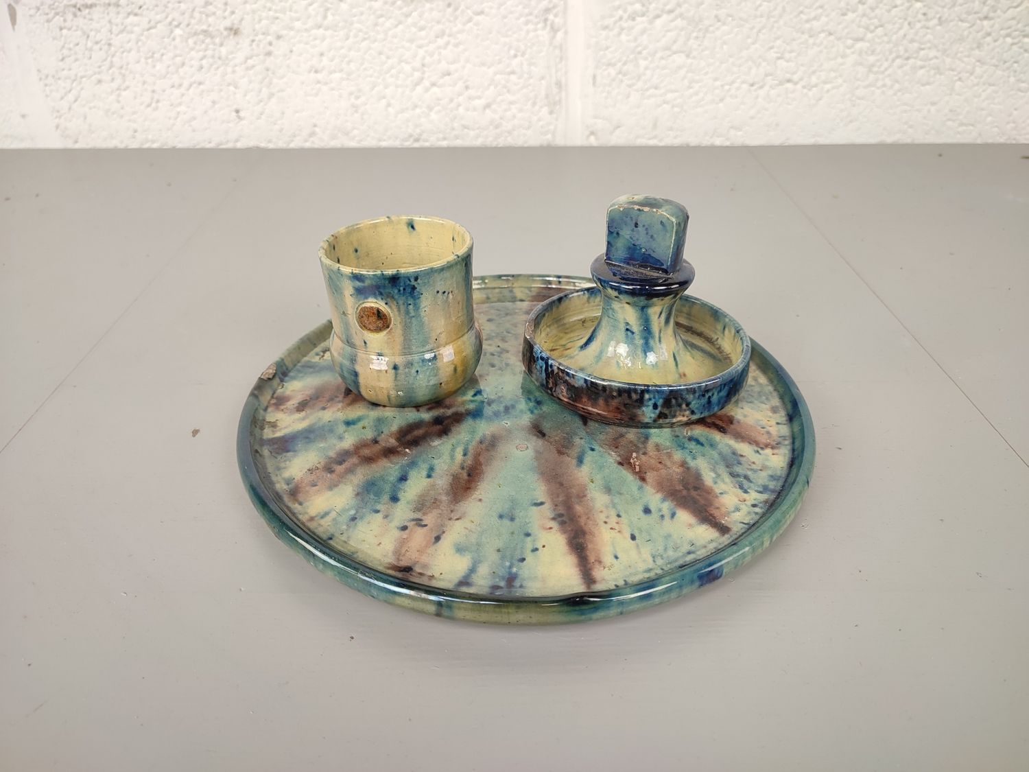 Smokers set in Flemish pottery