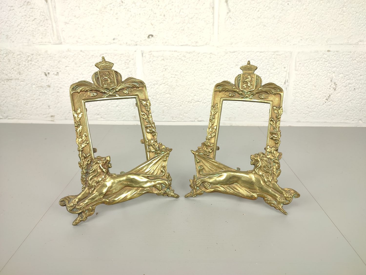 Pair of Belgian photo frames with lions