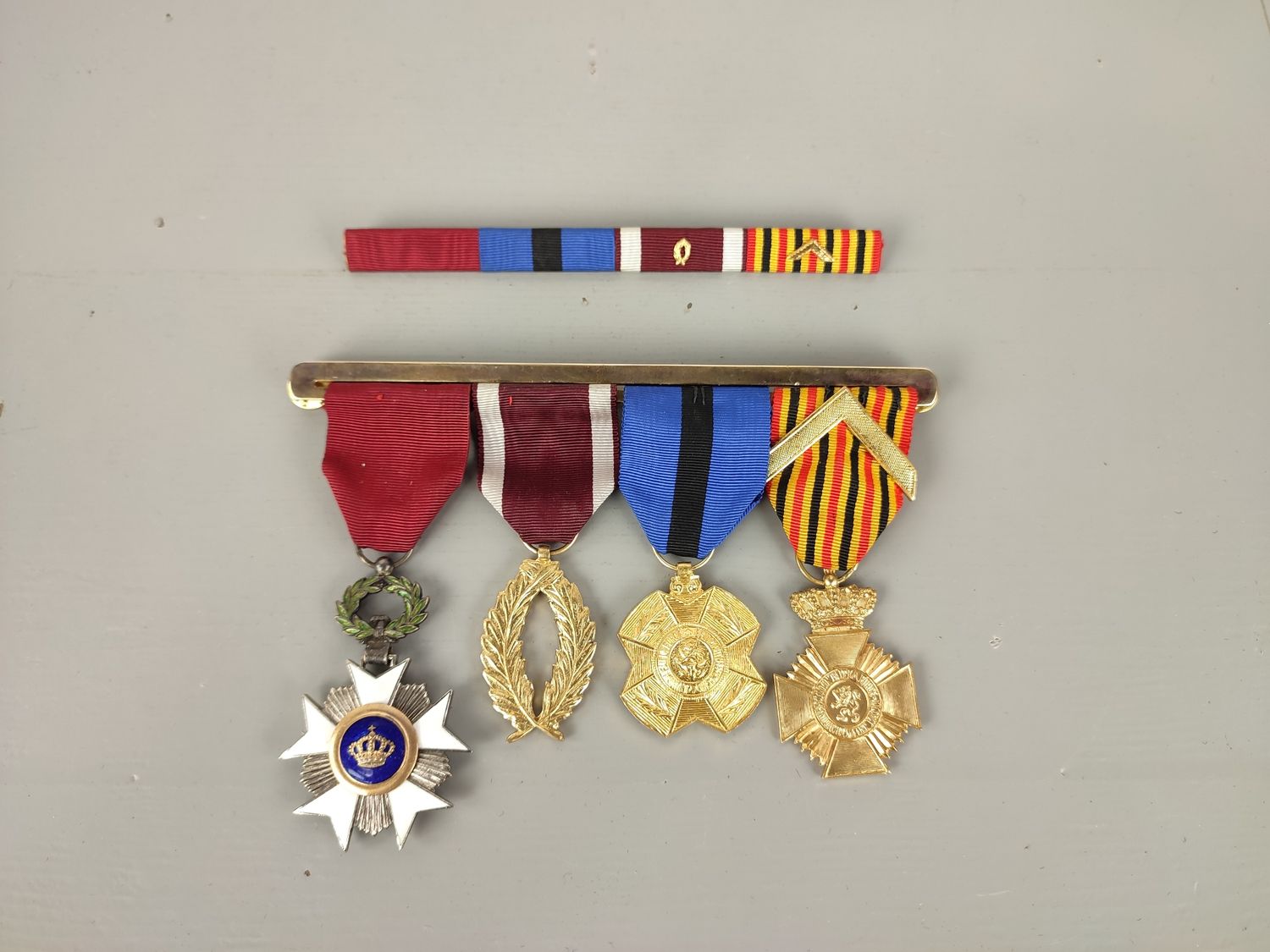4 Belgian medals on bar with ribbon bar