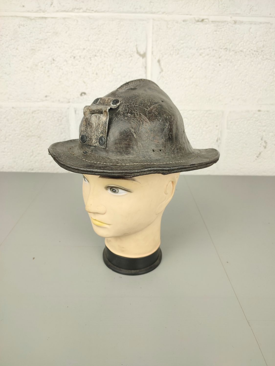 Antique leather miners helmet