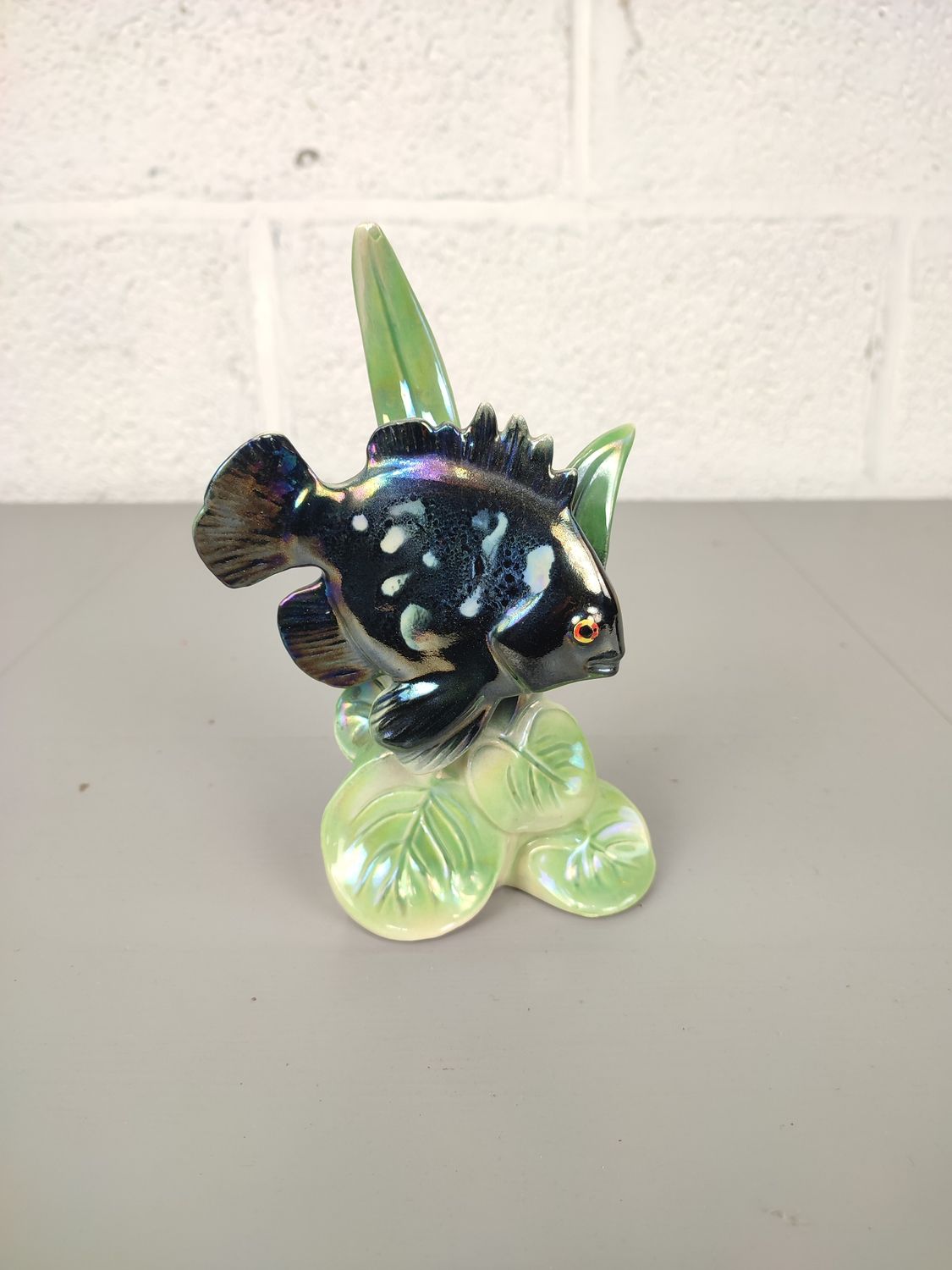 Porcelain sculpture of a fish, by Jema Holland