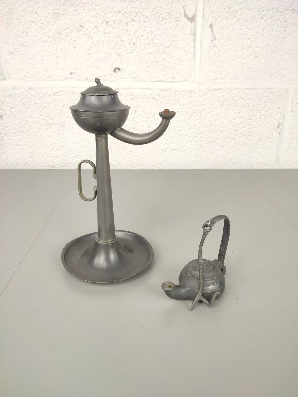 2 antique tin oil lamps