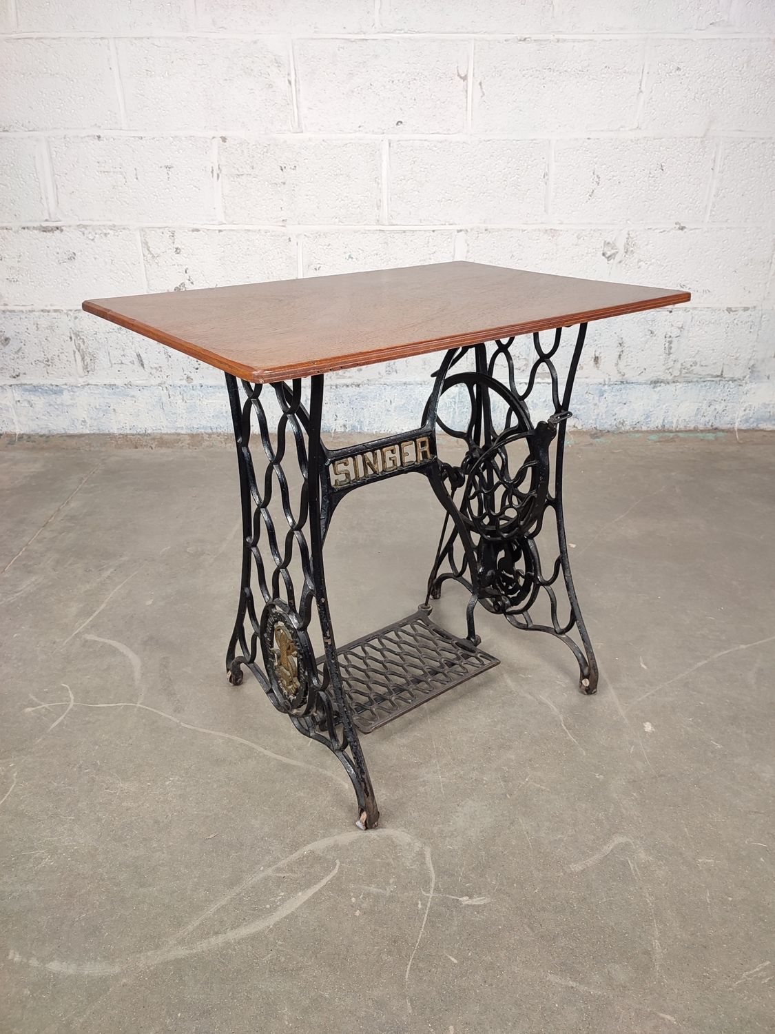 Table with Singer sewing machine base