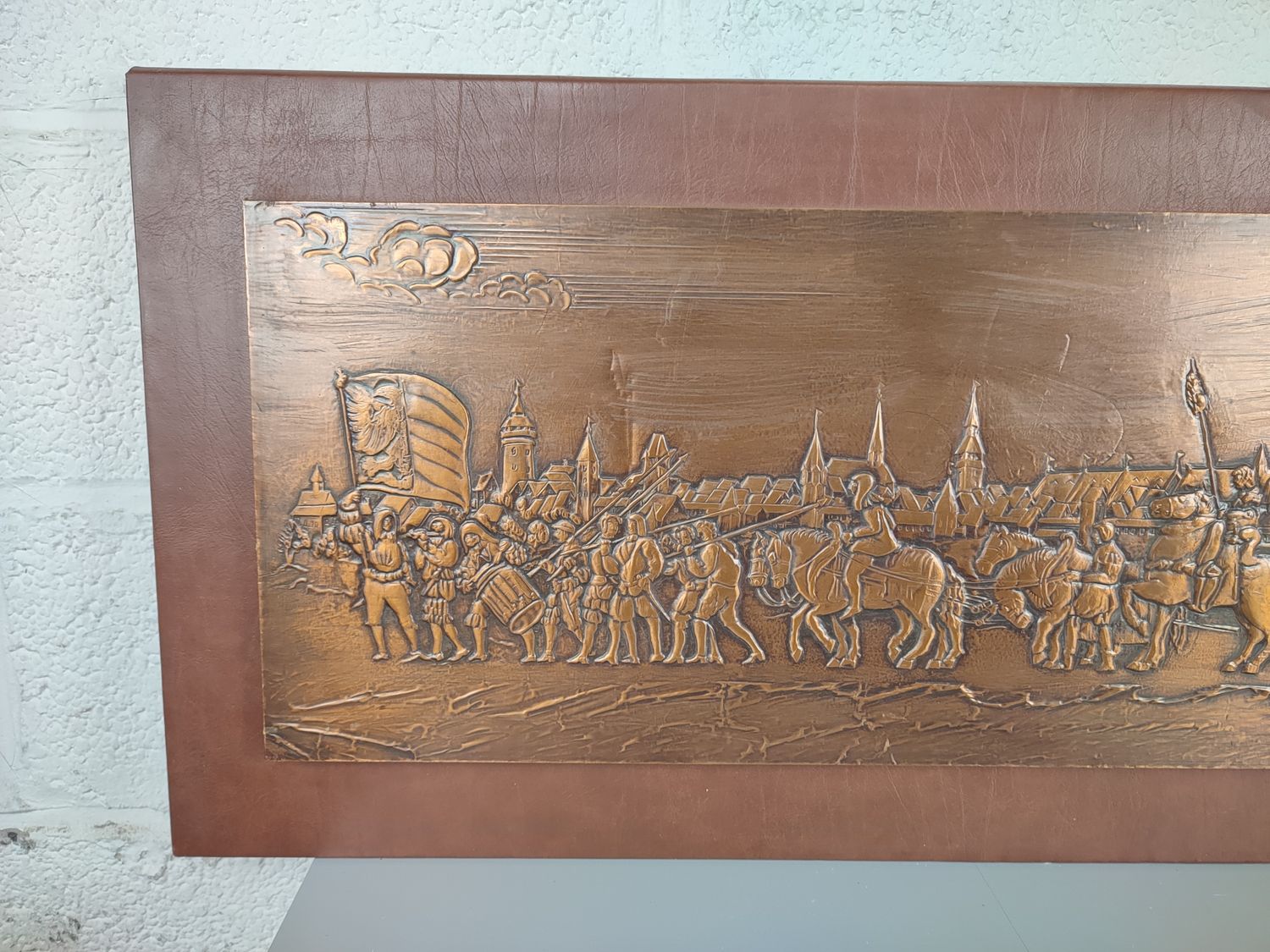 Large beaten copper bas-relief