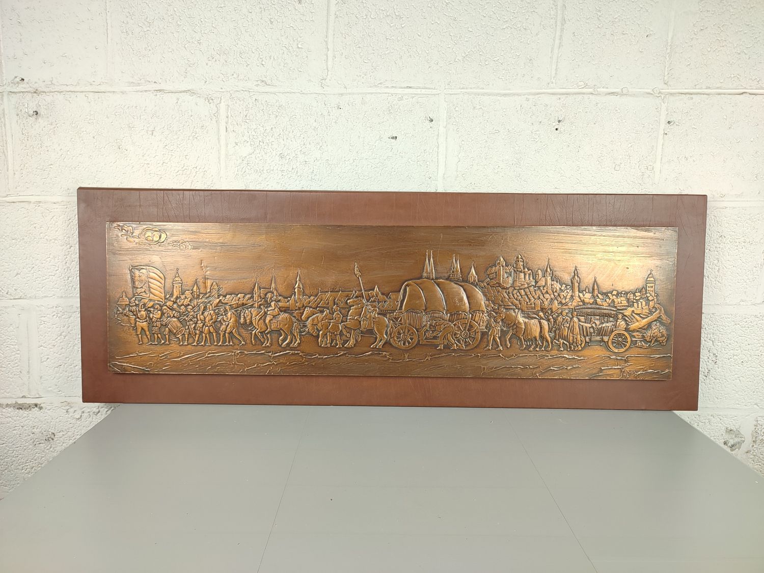 Large beaten copper bas-relief