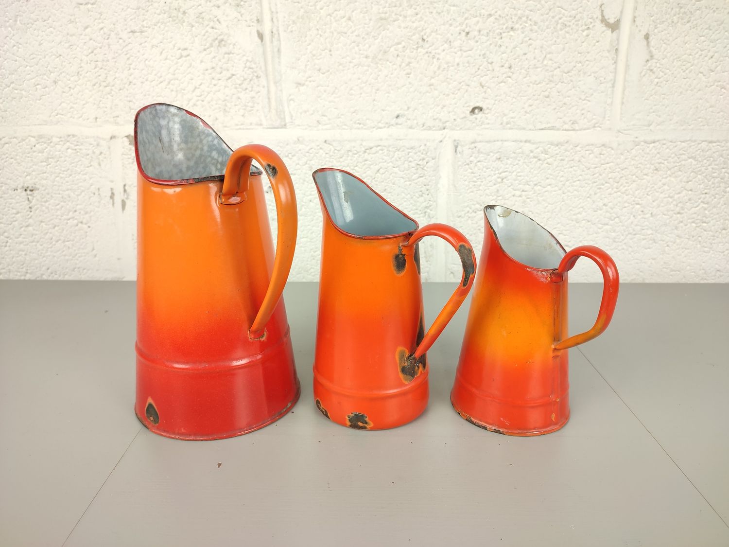 3 enamel jugs