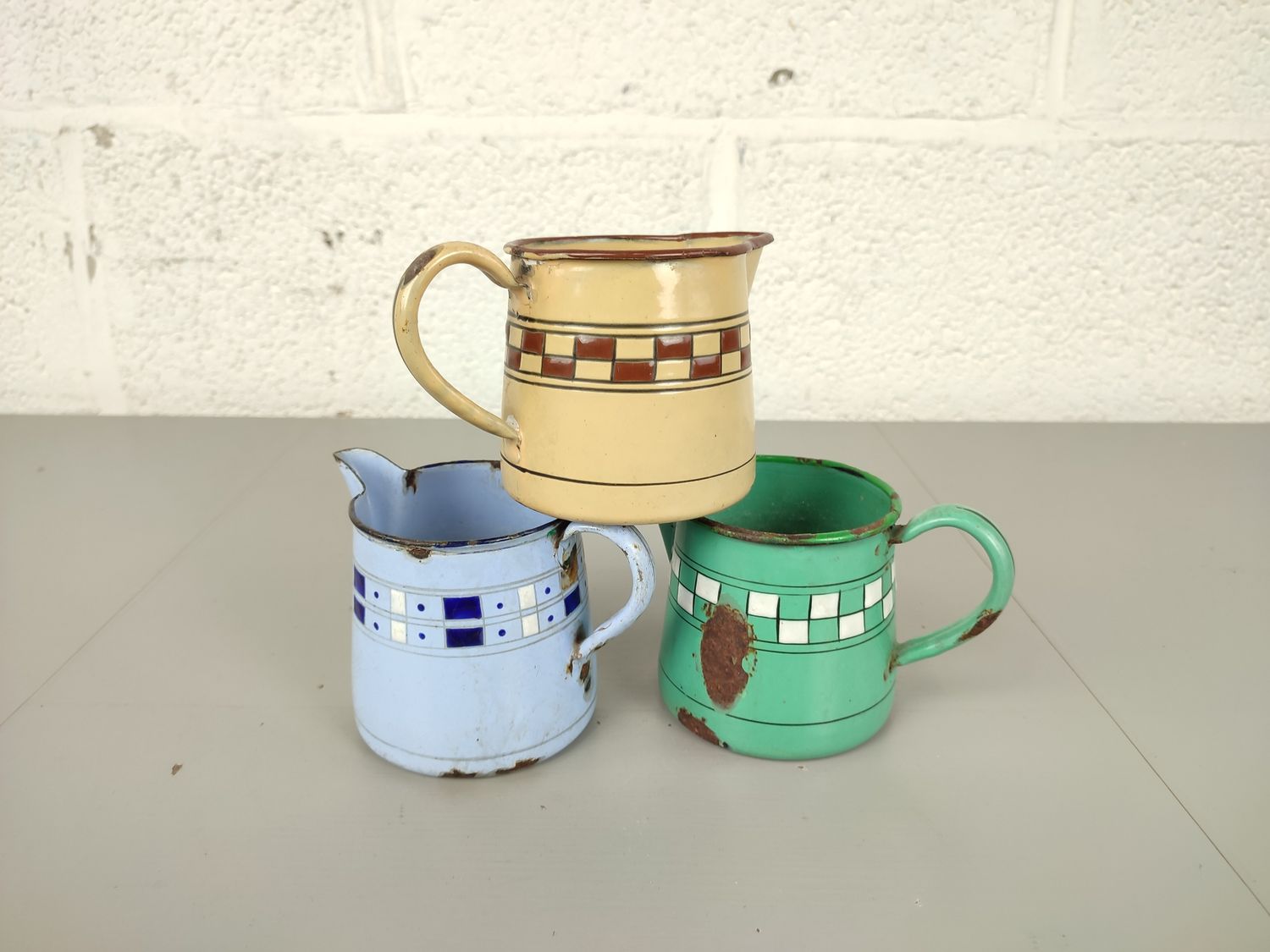 3 enamel jugs