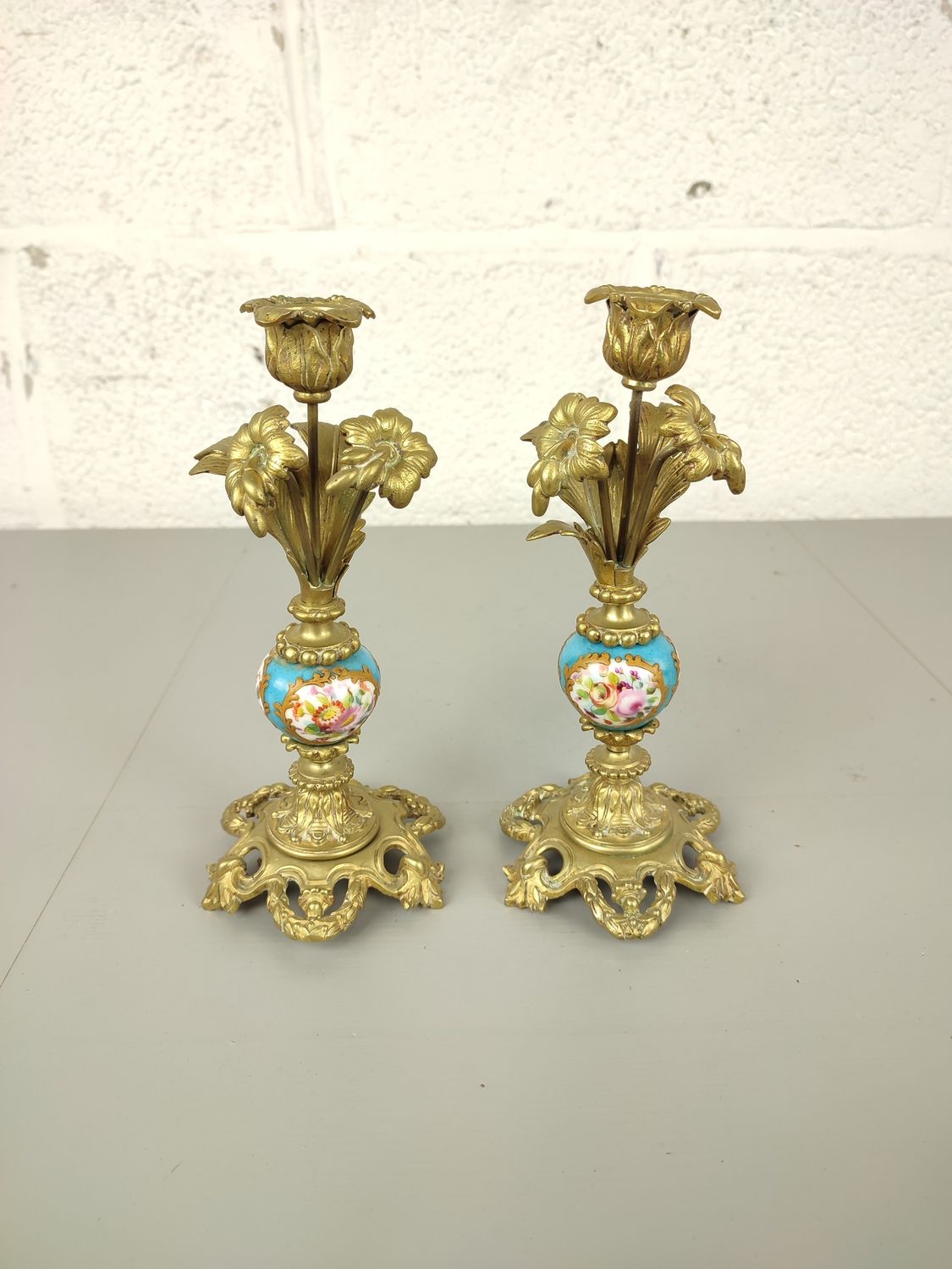 Pair of brass &amp; porcelain candlesticks