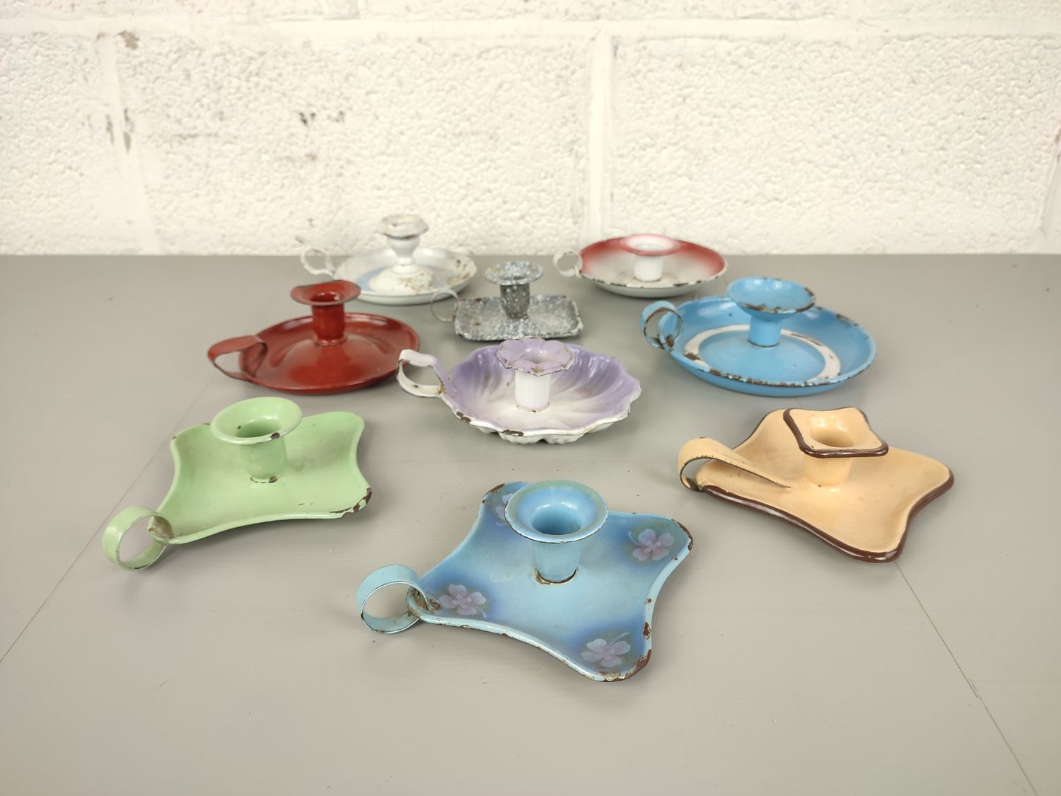 Collection of 9 enamel sconces
