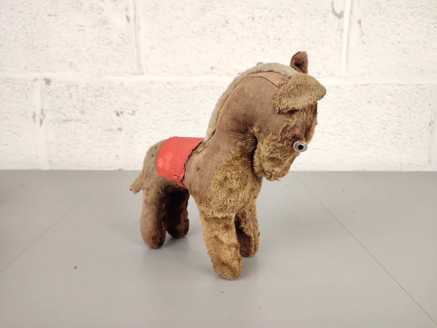Old plush toy donkey