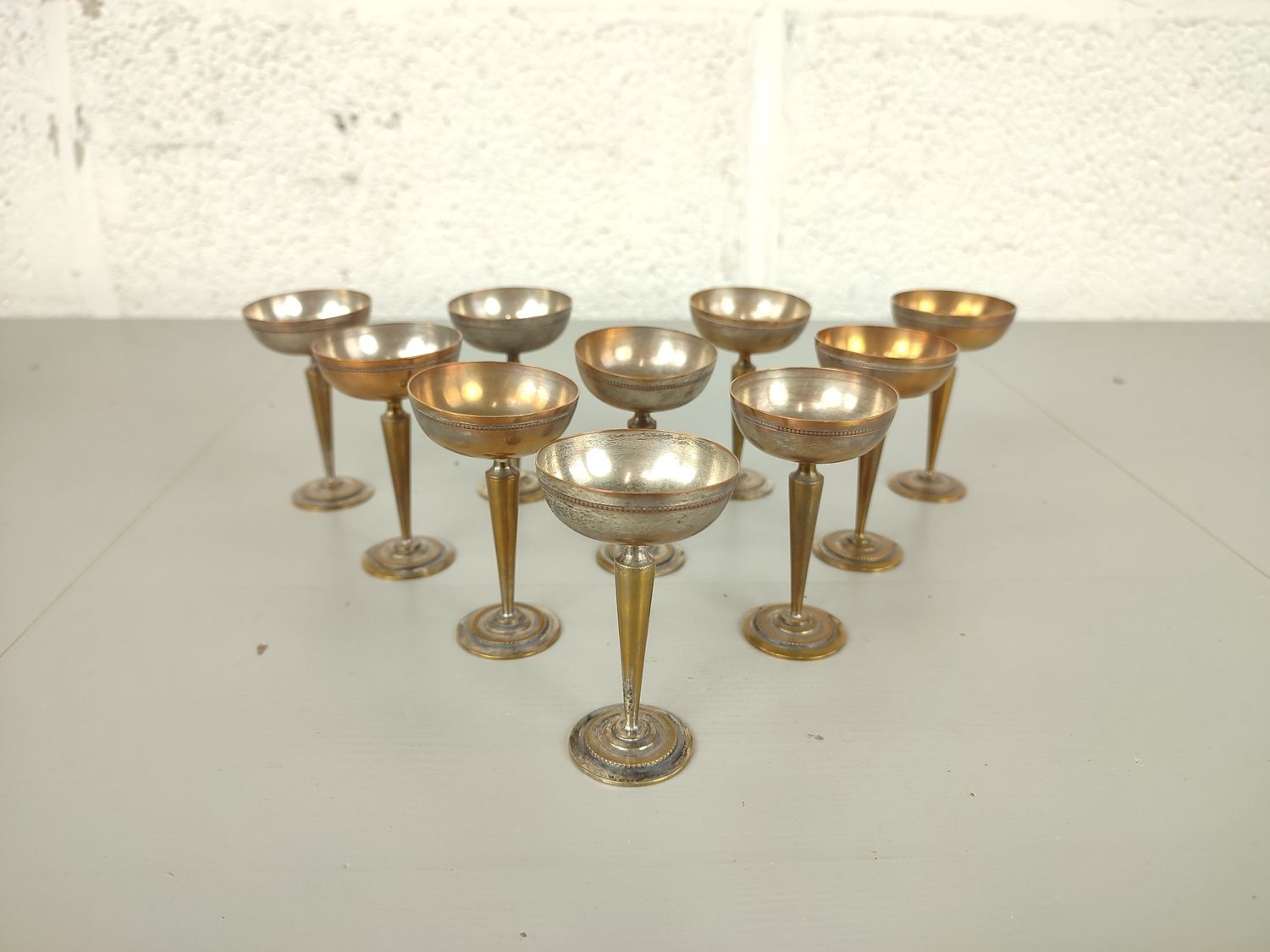 Set of 10 small silver-plated coupes