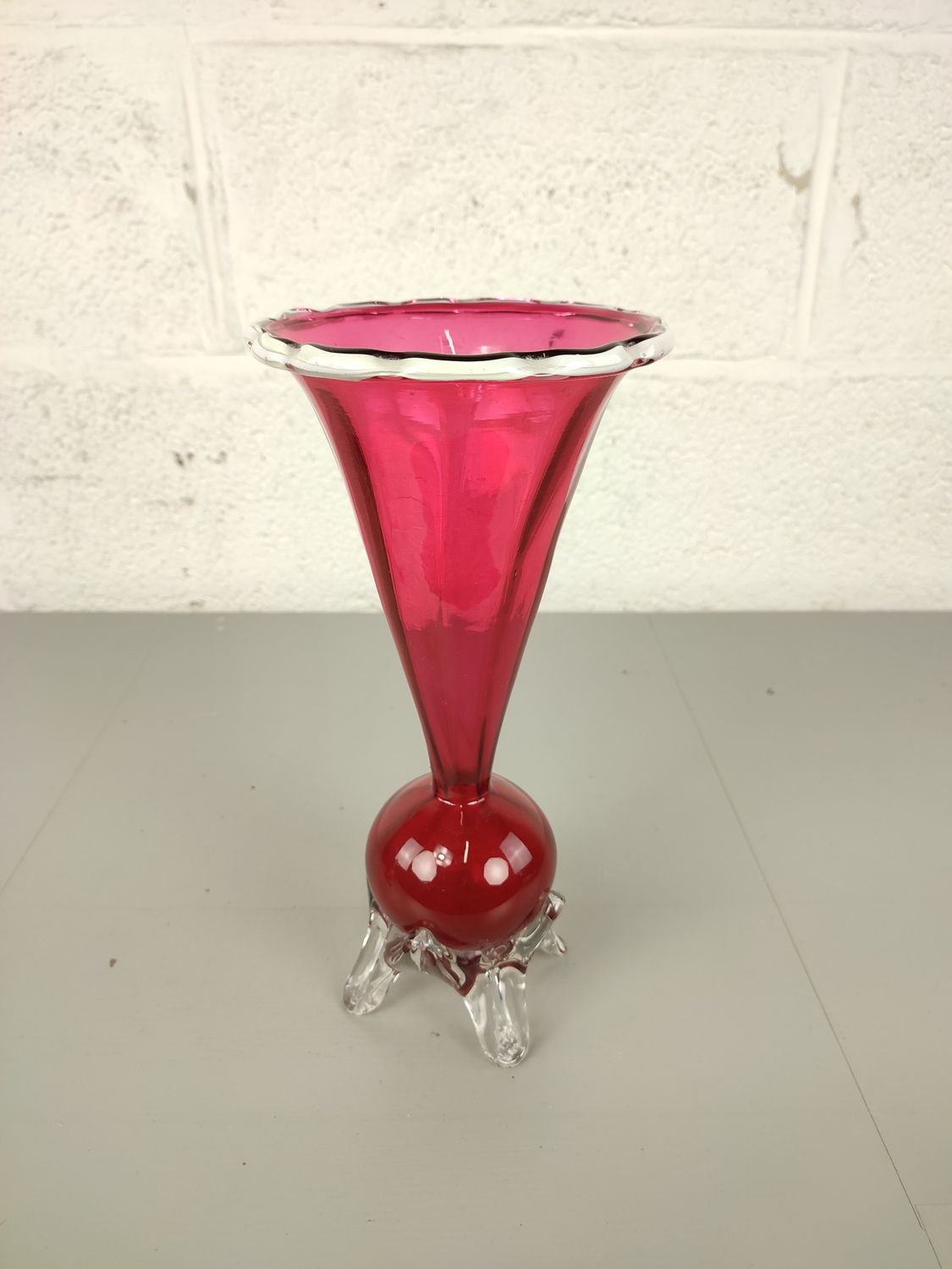 Vintage glass vase on legs