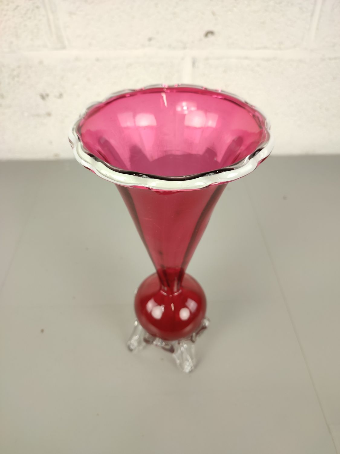 Vintage glass vase on legs