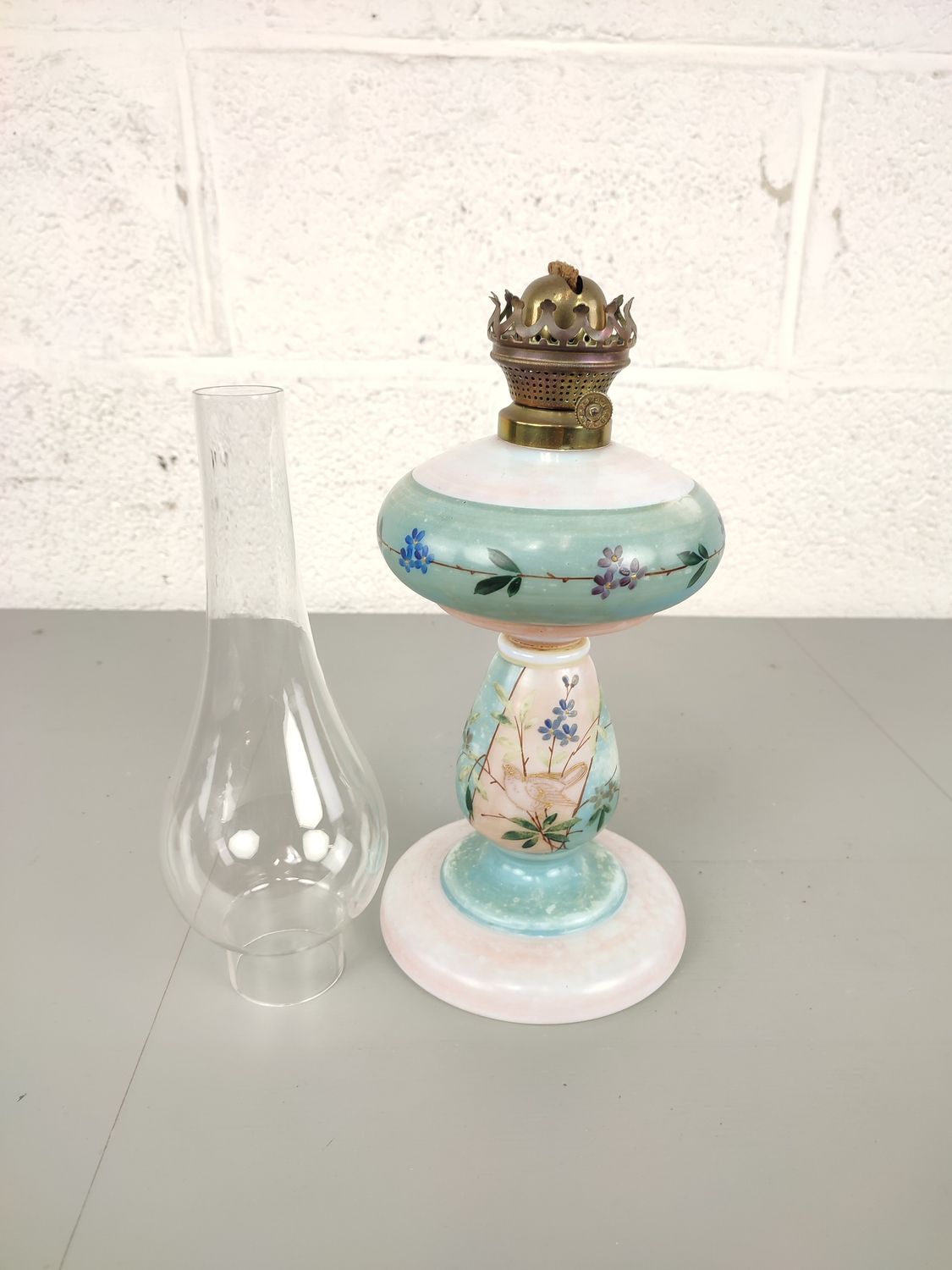 Antique oil lamp in opaline glass