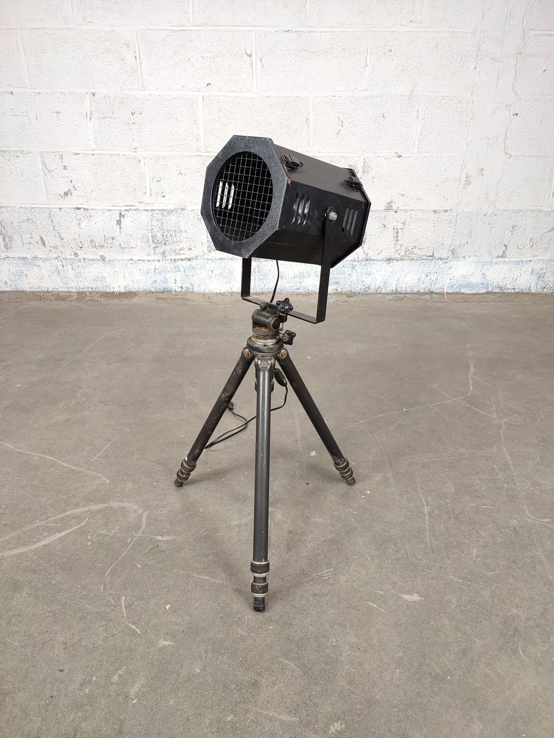 Old theater lamp on tripod