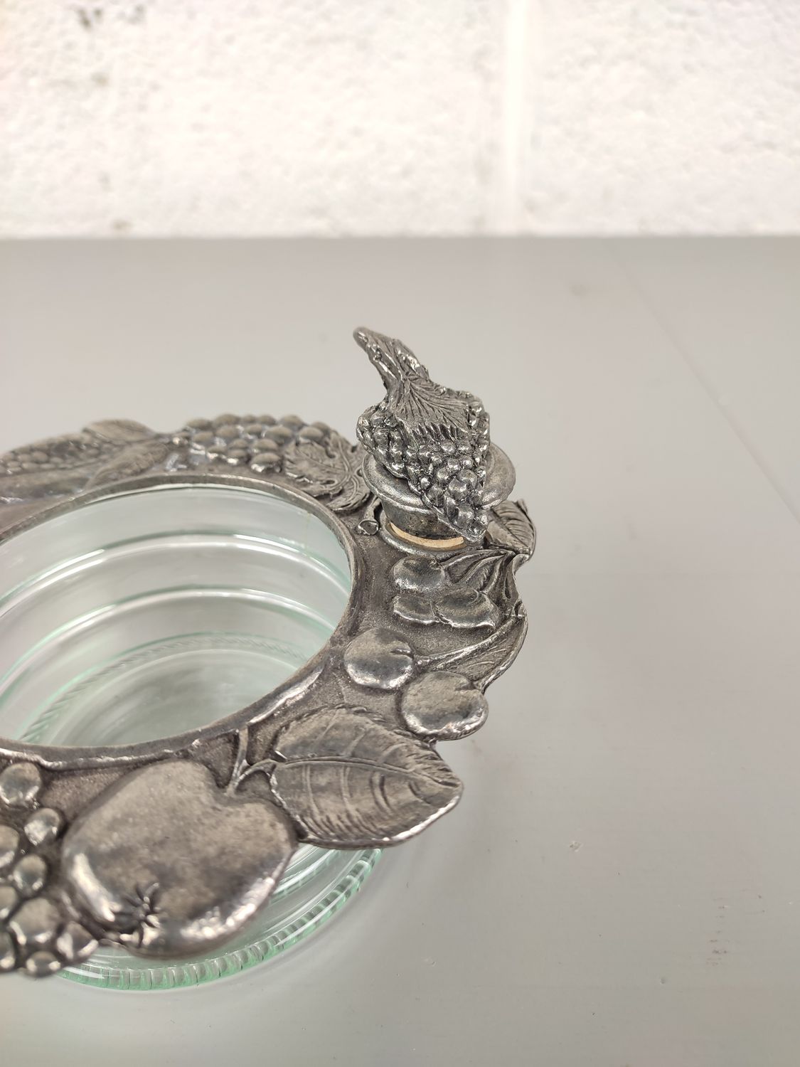 Coaster for a bottle