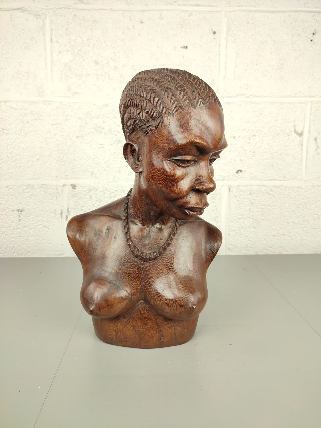 wooden bust of an African lady