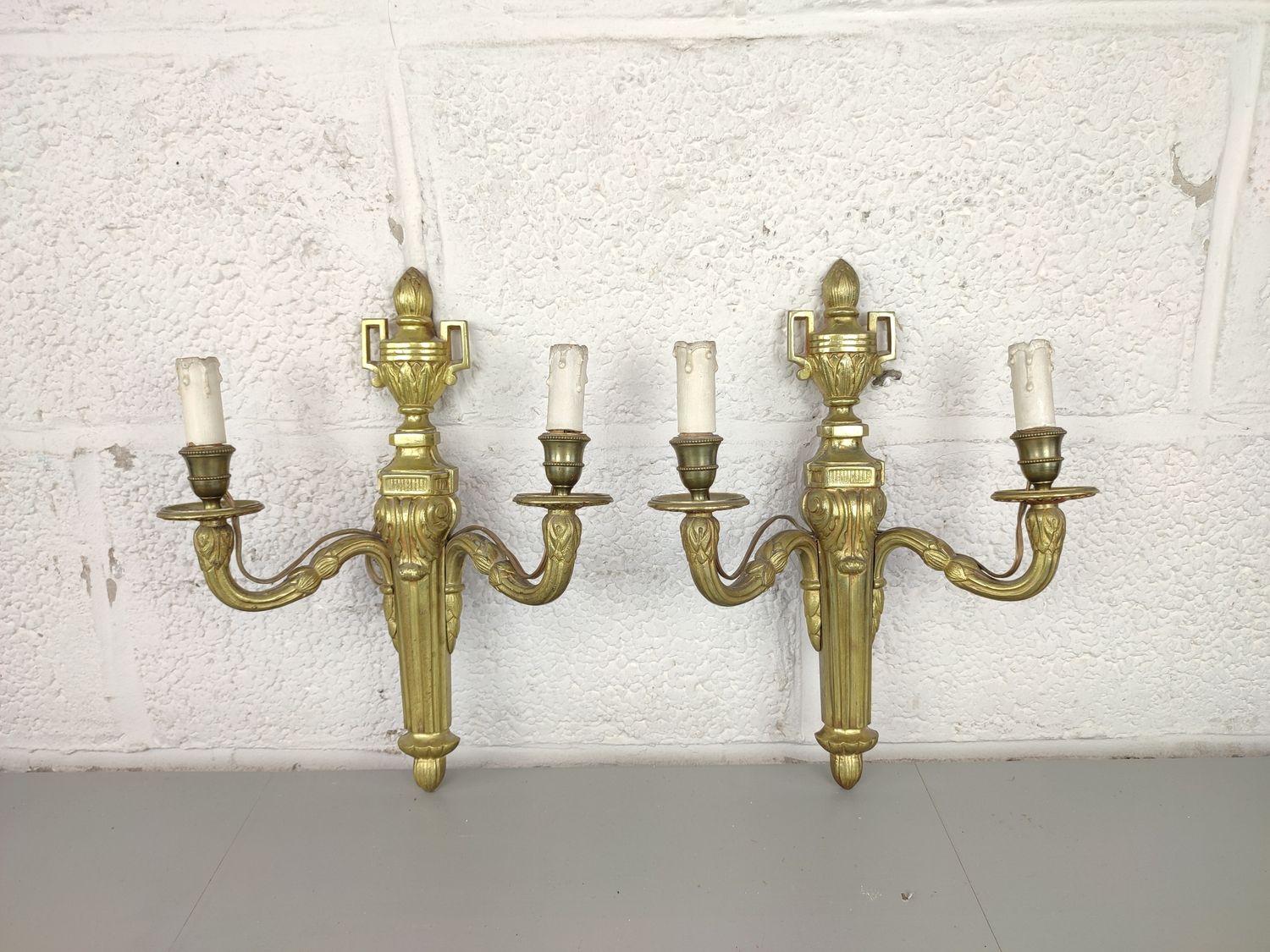 Pair of gilt bronze empire wall lamps