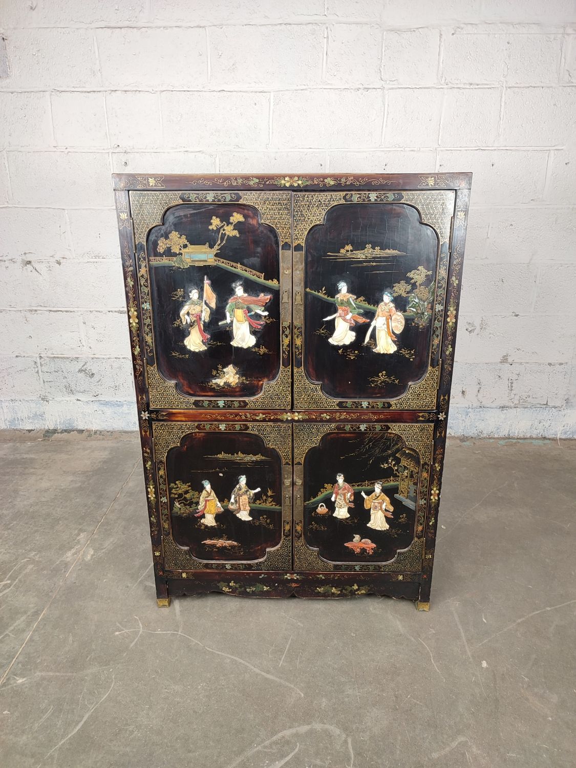 Chinese cabinet with soap stone figures