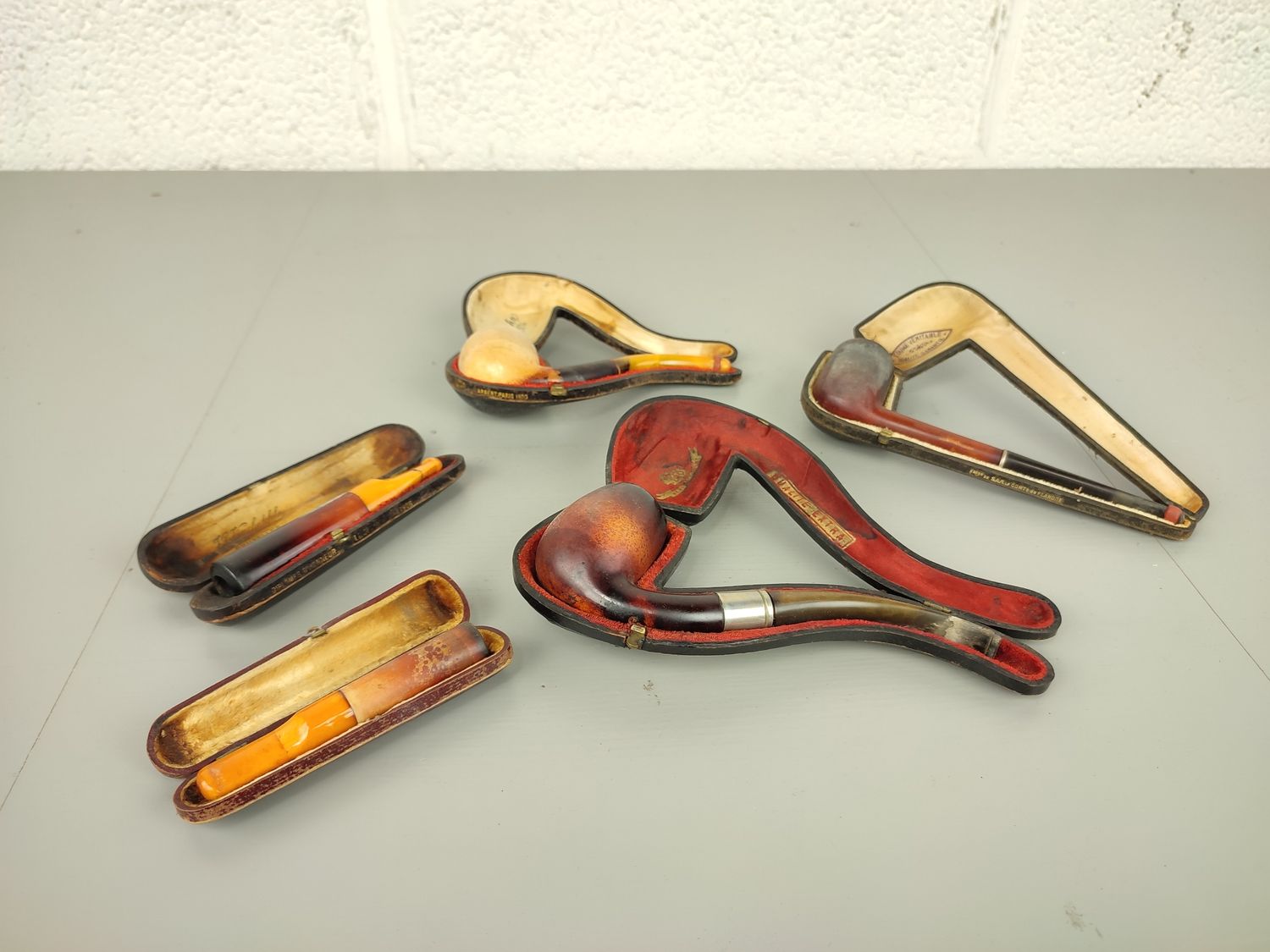 Lot of old pipes and mouthpieces