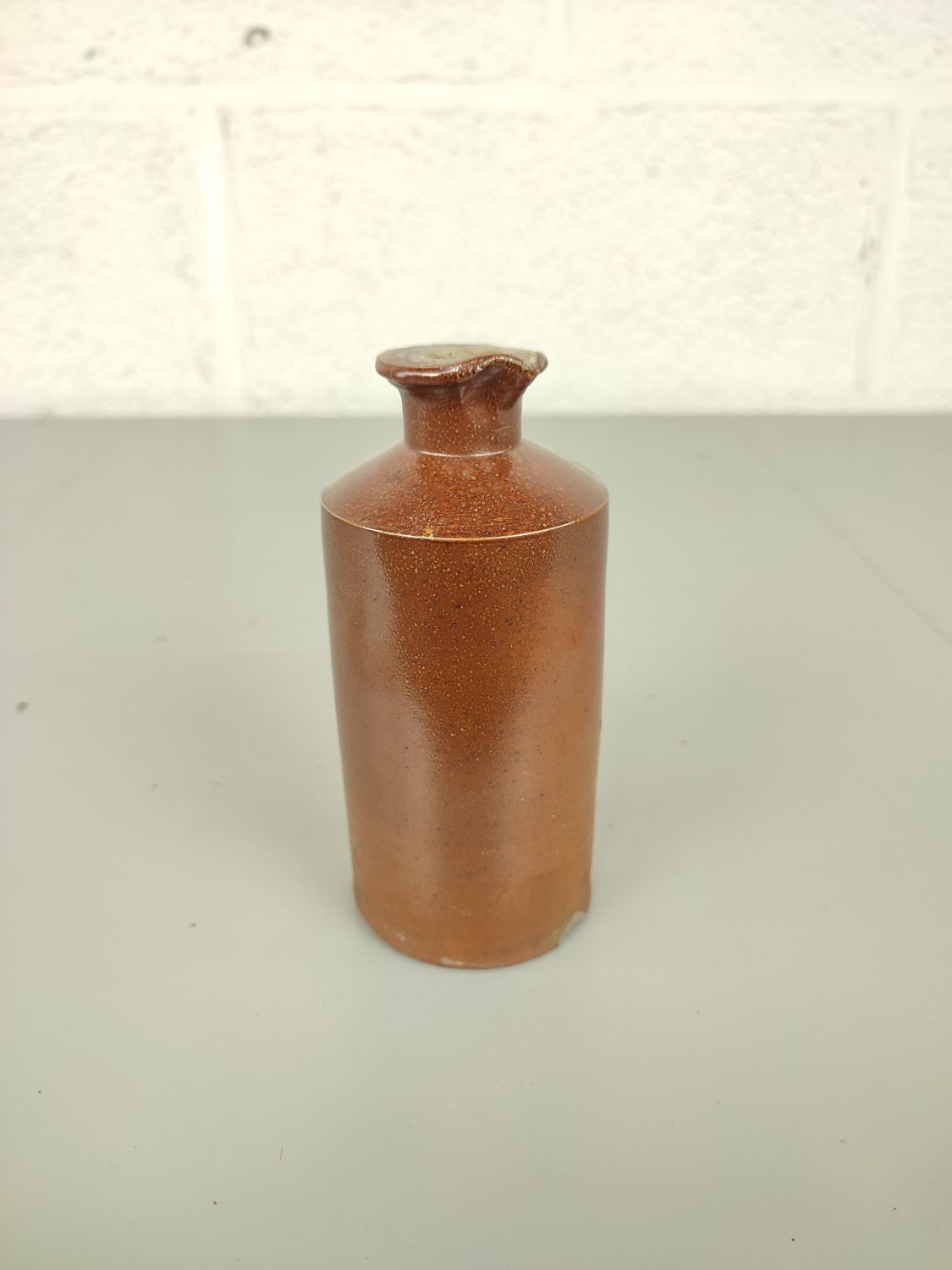 Antique earthenware inkbottle
